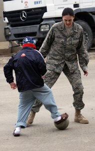 Ahmed plays soccer with Air Force nurse 1st Lt. Stephanie Allen outside the Joint Base Balad U.S. Air Force Hospital.