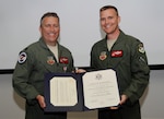 The 142nd Fighter Wing commander Col. Rick Wedan presents the Certificate of Retirement to Lt. Col. Steve Beauchamp during his retirement ceremony in Portland, Oregon, in 2013. A new military retirement proposal has been presented to Congress.