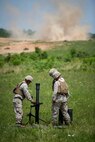 Marines from The Basic School (TBS) participate in determining the effectiveness of unloading and loading munitions from the M1161 Growler Internally Transportable Vehicle (ITV).