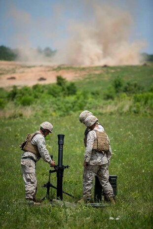 Marines from The Basic School (TBS) participate in determining the effectiveness of unloading and loading munitions from the M1161 Growler Internally Transportable Vehicle (ITV).