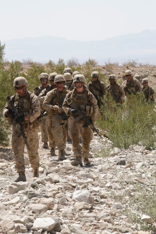 Marines with Lima Company, 3rd Battalion, 25th Marines Regiment, 4th Marine Division, Marine Forces Reserve, patrol during the 2015 Integrated Training Exercise at Marine Corps Air Ground Combat Center Twentynine Palms, Calif., June 14, 2015. ITX allows Reserve Marines to train in realistic environments under realistic conditions, which helps Marines maintain a high level of proficiency and readiness for worldwide deployment.