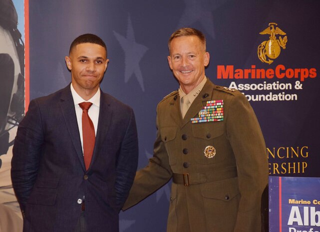 Sgt. Josue Balbuena, enlisted barracks manager and unit energy manager, Marine Corps Logistics Base Albany, poses with Lt. Gen. William Faulkner, deputy commandant, Installations and Logistics, at a Marine Corps Association and Foundation hosted dinner at the Hilton Garden Inn, Albany, Georgia, recently. 