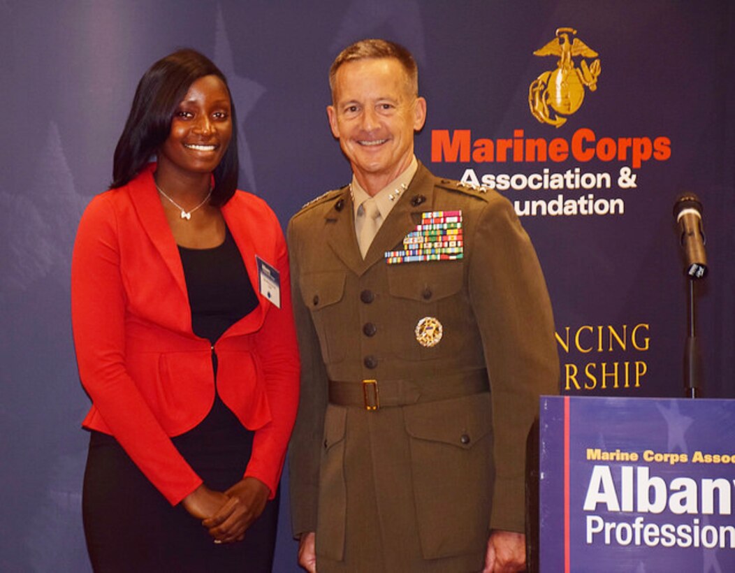 Sgt. Artisha Burnett, supply chief and Single Marine Program President, Marine Corps Logistics Command, poses with Lt. Gen. William Faulkner, deputy commandant, Installations and Logistics, at a Marine Corps Association and Foundation hosted dinner at the Hilton Garden Inn, Albany, Georgia, recently. 