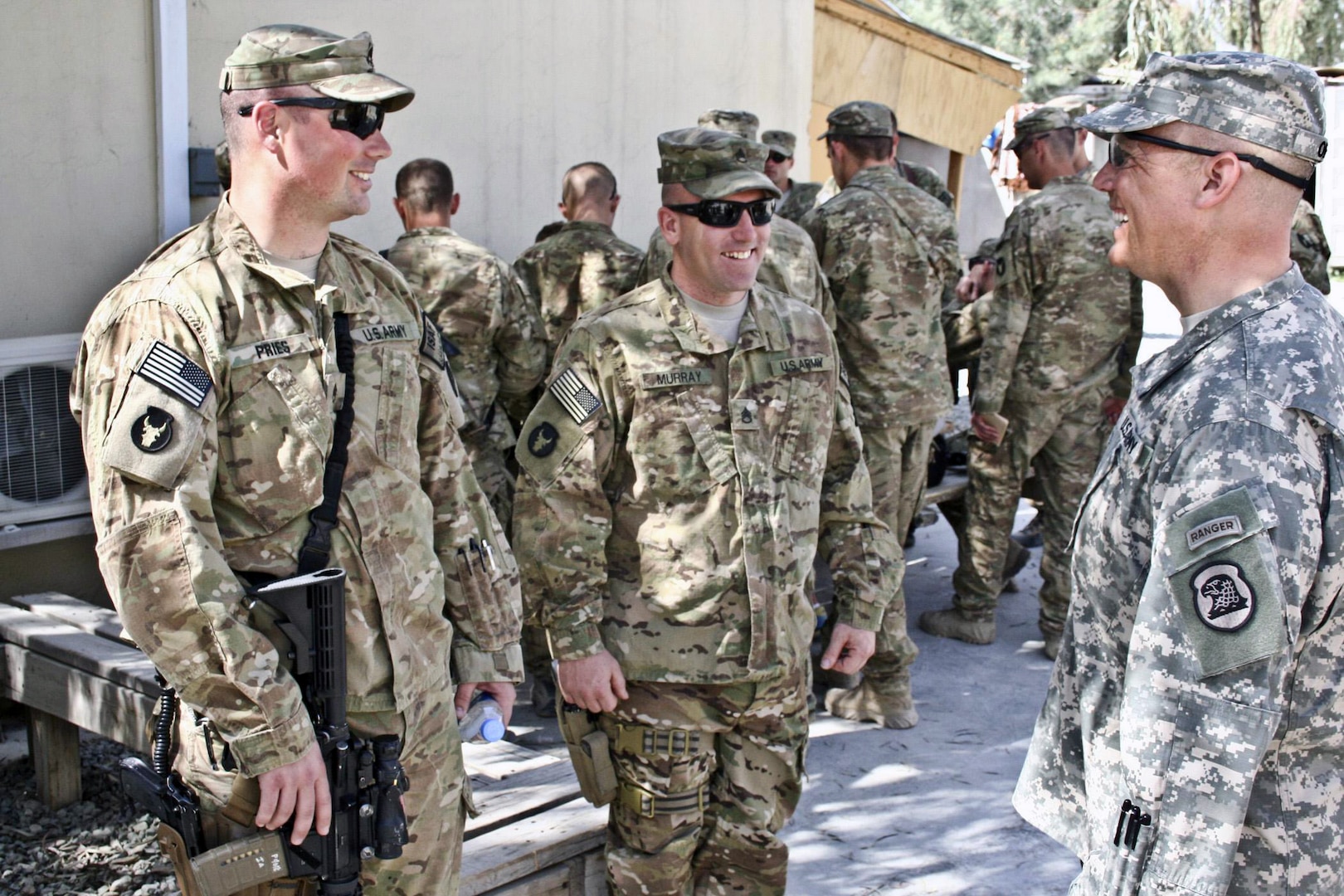 Army Maj. Gen. Tim E. Orr, right, adjutant general of the Iowa National
Guard, talks with Army Staff Sgt. Jacob Pries, left, an engineer with
Headquarters and Headquarters Company, 2nd Brigade Combat Team, 34th
Infantry Division, and  Army Staff Sgt. Scott Murray Jr., center, a squad
leader with Company A, 1st Battalion, 133rd Infantry Regiment, March 22,
2011, during his visit to Forward Operating Base Mehtar Lam, Afghanistan.