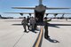 Critical care air transport teams and aeromedical evacuation crewmembers practice transporting critically ill patients on a C-130J Super Hercules from the California Air National Guard's 146th Airlift Wing, Channel Islands Air National Guard Station, California. during 349th Air Mobility Wing Air Force Specialty Code training June 6, 2015, at Travis Air Force Base, California.  In preparation for the training, the 349th Aeromedical Evacuation Squadron transformed the four-engine tactical transport into a flying hospital. In turn, the CCATT teams from the 60th Surgical Operations Squadron and the 349th Aeromedical Staging Squadron established onboard what was essentially a portable intensive care unit dedicated to one very ill, simulated, 