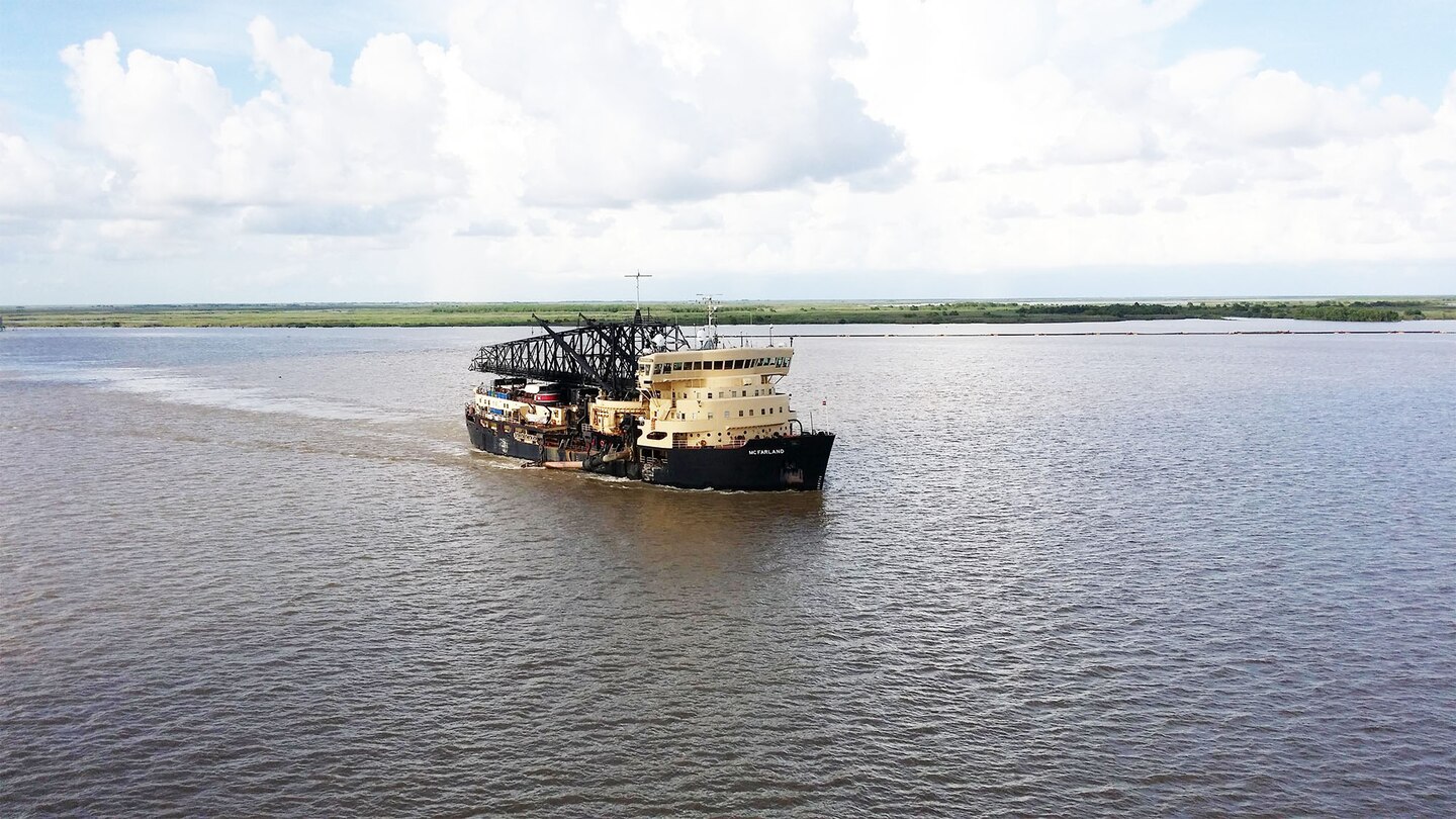 The McFarland, a deep-draft hopper dredge owned and operated by USACE Philadelphia District, conducted urgent dredging for 62 days on the Southwest Pass of the Mississippi River starting in late March of 2015. The dredge was called upon because high stages impacted navigation along the Mississippi River. 