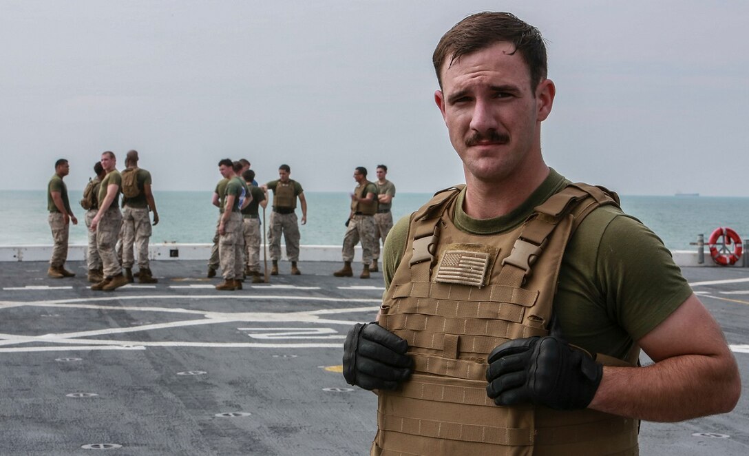U.S. Marine Sgt. Garrett Kastl is a motor transport operator and platoon sergeant with Combat Logistics Battalion 15, 15th Marine Expeditionary Unit, aboard the USS Anchorage (LPD 23). As a platoon sergeant, Kastl has an important role to supervise his platoon while they conduct preventative maintenance. Kastl firmly believes in leading from the front and guiding his junior Marines. “Noncommissioned officers are essential, needed, and respected,” said Kastl, which is the reason corporals and sergeants are trusted to be able to hold such billets. Kastl’s dedication to his billet truly embodies the mission of small unit leadership. (U.S. Marine Corps photo by Sgt. Steve H. Lopez/Released)
