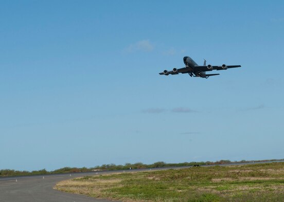 A KC-135 Stratotanker from the 96th Air Refueling  Squadron takes off for the final operation mission of the 96th ARS on Joint Base Pearl Harbor-Hickam, Hawaii, June 11, 2015. The aircraft was one of a four KC-135s that flew to mark the end of the 96th ARS’s  operational mission as a total force integration squadron at the 15th Wing. (U.S. Air Force Photo by 1st Lt. Andrea Dykes/Released)