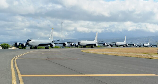 Four KC-135 Stratotankers, from the 96th Air Refueling  Squadron, taxi  prior to taking off for the final operational mission of the 96th ARS on Joint Base Pearl Harbor-Hickam, Hawaii, June 11, 2015. To mark the historic final mission four KC-135 showed the range of KC-135 capabilities by conducting aerial refueling and defensive maneuvering as a four ship. The 96th ARS will hold a deactivation ceremony marking the end of their five years of service as a total force integration squadron at the 15th Wing. (U.S. Air Force Photo by Tech Sgt. Terri Paden/Released)