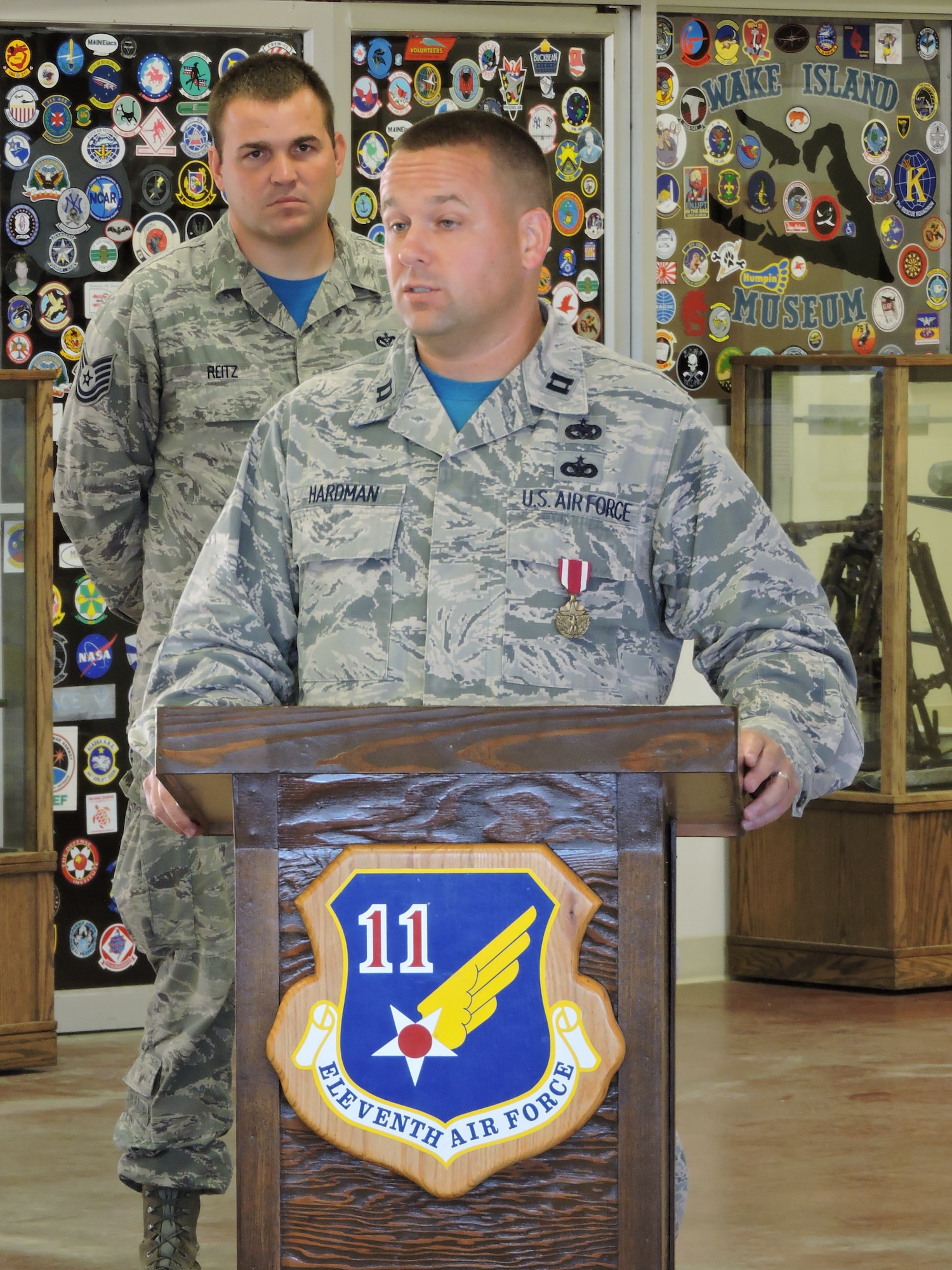 Capt. Jason Hardman addresses the members of Detachment 1, Pacific Air Forces Regional Support Center one last time at Wake Island Airfield, Hawaii June 12. Hardman relinquished command of Det. 1 to Capt. Ronald Dion. As commander of Det. 1, Capt. Dion is responsible for three military and 90 contractor personnel operating the detachment. Command of Det. 1 is a one-year remote assignment. (U.S. Air Force photo/Mr. Tommie Baker)