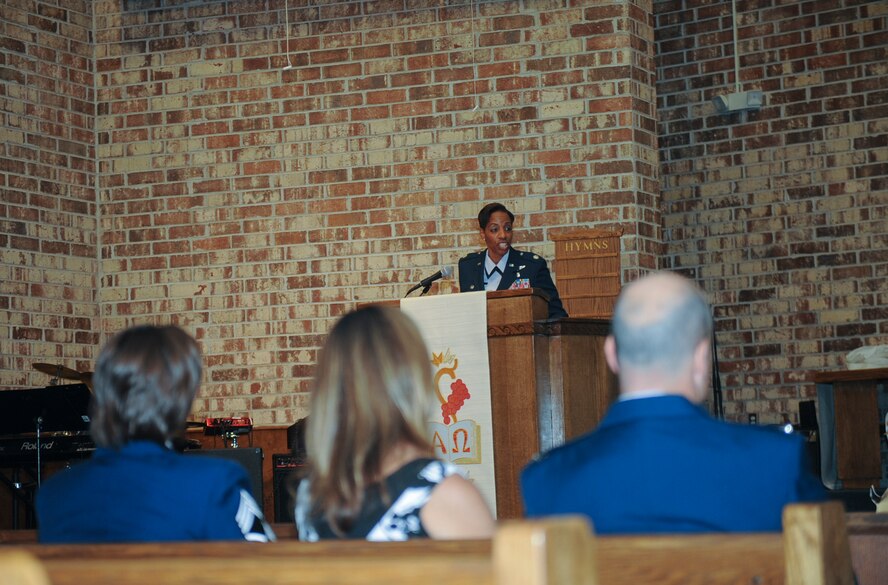 U.S. Air Force Lt. Col. LaRhonda Gray, 23d Aerospace Medicine Squadron commander, recites a bible scripture during a memorial service held for Velma Head June 11, 2015, at Moody Air Force Base, Ga. Head dedicated 43 years of service to the Air Force. (U.S. Air Force photo by Senior Airman Olivia Bumpers/Released)