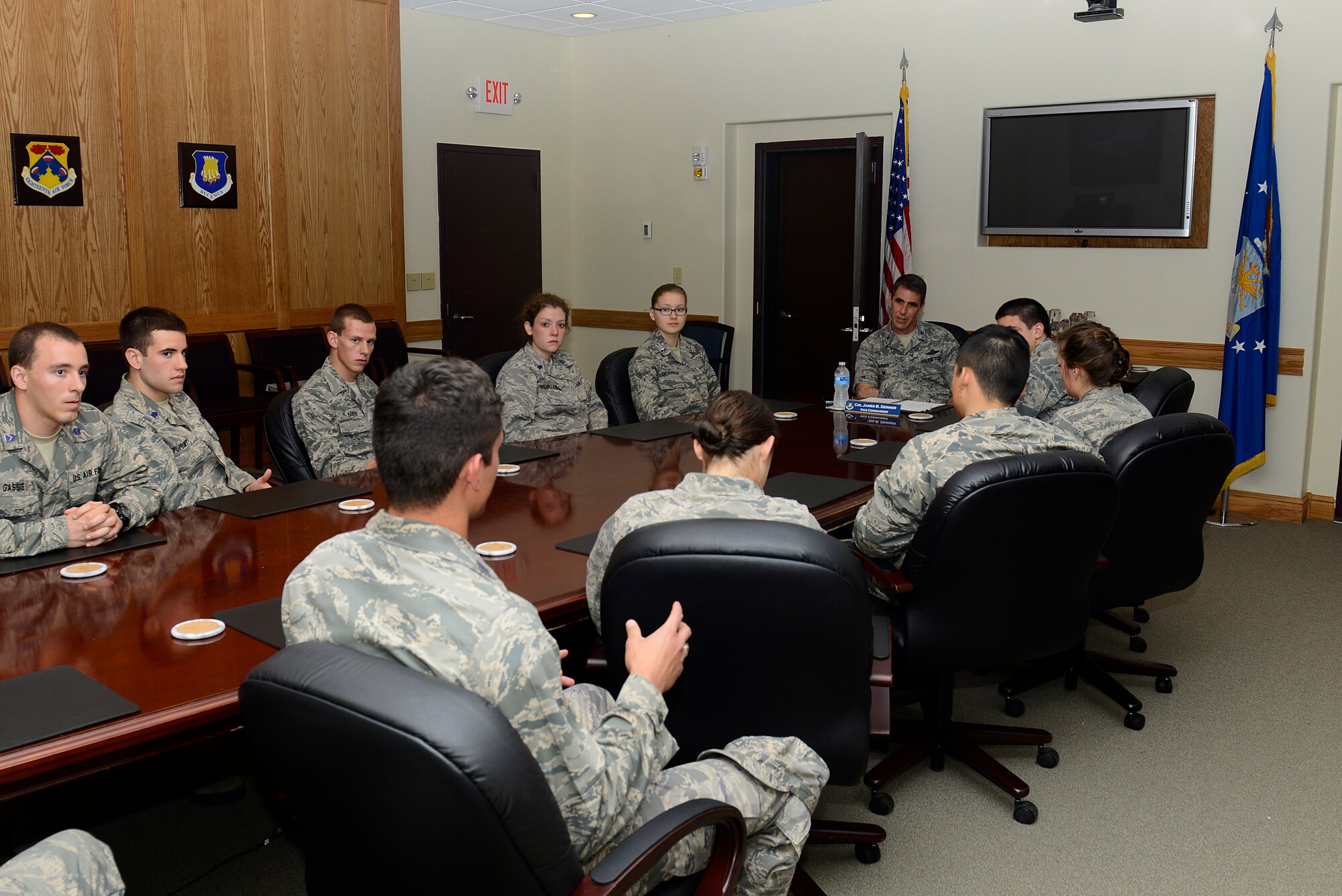 Col. James Dermer, 22nd Air Refueling Wing vice commander, listens to feedback from a cadet during his visit to Team McConnell, June 15, 2015, at McConnell Air Force Base, Kan. Cadets from the Air Force Academy and various ROTC detachments toured McConnell as a way to learn how the Air Force operates and to gain a better understanding of the different career fields available to them once they graduate. (U.S. Air Force photo by Senior Airman Trevor Rhynes)