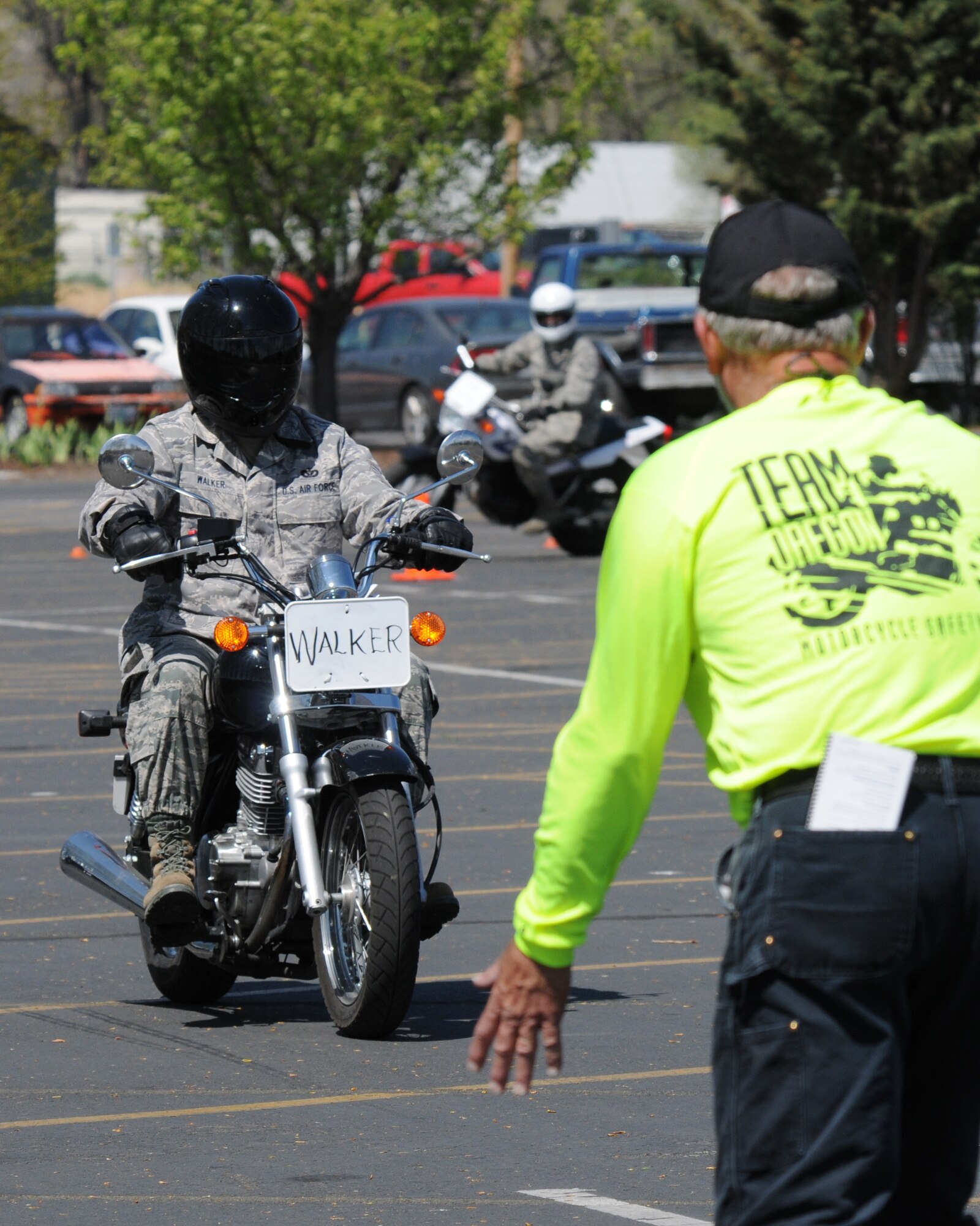 Oregon Air National Guard Tech. Sgt. Carl Walker, 270th Air Traffic Control Squadron, receives instruction during an exercise at a "Rider Skills Practice" course offered by Team Oregon at Klamath Falls, Ore., May 2, 2015. Team Oregon's RSP course provides motorcyclists with additional training exercises that build critical crash-avoidance skills such as stopping quickly, swerving effectively, and cornering skillfully. (U.S. Air National Guard photo by Senior Airman Penny Snoozy/Released)