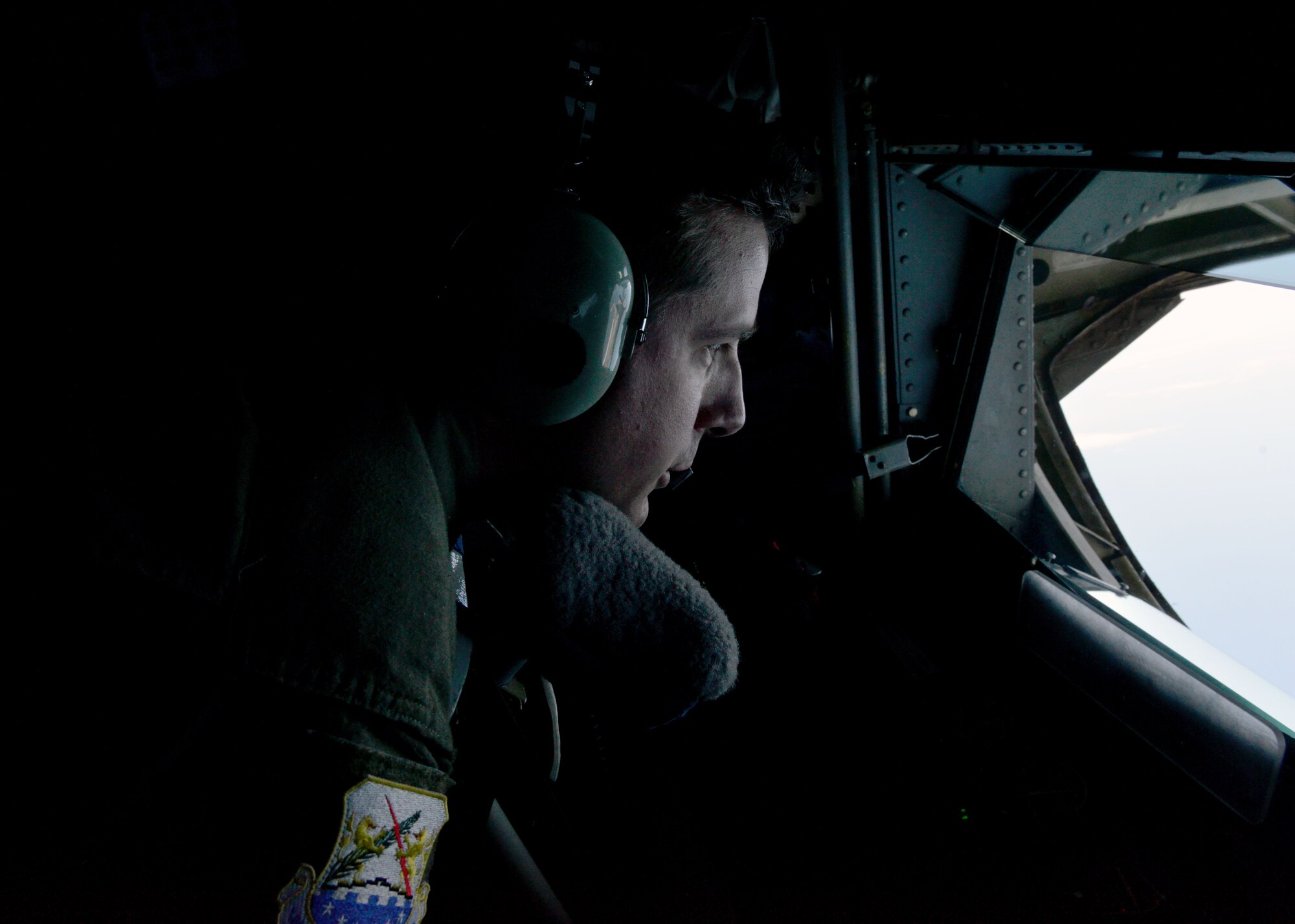 Tech. Sgt. Dave Thoresen, 100th Air Refueling Wing boom operator, waits for an approaching aircraft during a Baltic Operations 2015 refueling mission June 15, 2015, at Powidz Air Base, Poland. As part of BALTOPS 2015, the U.S. Air Force deployed four KC-135s to Poland from the 100th, 916th and 507th air refueling wings, as well as 14 F-16 Fighting Falcons from the 480th and 157th fighter squadrons, and three B-52 Stratofortress' from the 5th Bomb Wing. (U.S. Air Force photo by Senior Airman Michael Battles) 