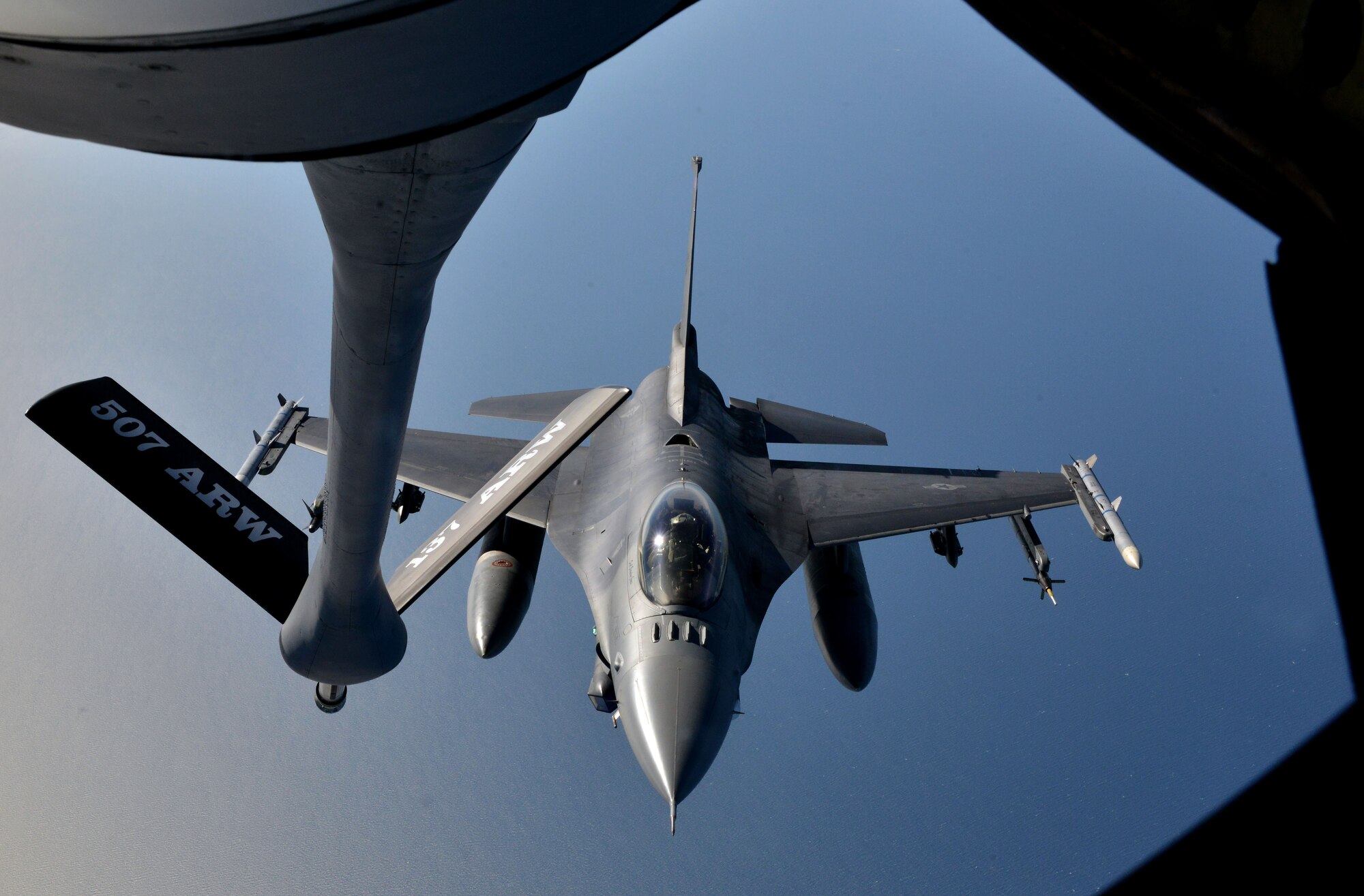 An F-16 Fighting Falcon from the 480th Fighter Squadron approaches a KC-135 Stratotanker to refuel during a Baltic Operations 2015 refueling mission June 15, 2015, at Powidz Air Base, Poland. As part of BALTOPS 2015, the U.S. Air Force deployed four KC-135s to Poland from the 100th, 916th and 507th air refueling wings, as well as 14 F-16 Fighting Falcons from the 480th and 157th fighter squadrons, and three B-52 Stratofortress' from the 5th Bomb Wing. (U.S. Air Force photo by Senior Airman Michael Battles) 