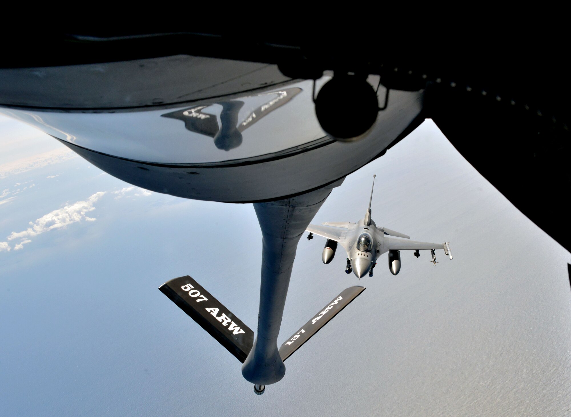 An F-16 Fighting Falcon from the 480th Fighter Squadron approaches a KC-135 Stratotanker to refuel during a Baltic Operations 2015 refueling mission June 15, 2015, at Powidz Air Base, Poland. Participating nations in BALTOPS include Norway, Germany, Latvia, Poland, Canada, France, Denmark, Georgia, Estonia, Finland, Turkey, Belgium, Sweden, the United Kingdom, Lithuania, the Netherlands, and the United States. (U.S. Air Force photo by Senior Airman Michael Battles) 