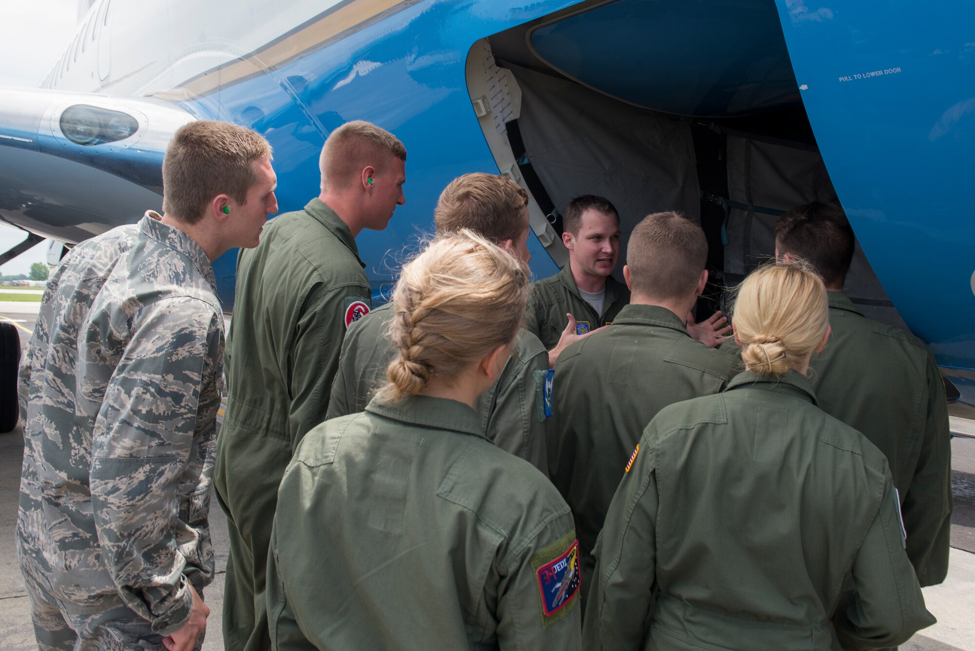 Maj. Jonathan Lauer shows the cadets the exterior of a C-40 and explains to them how to do a pre- flight check June 8, 2015 at Scott Air Force Base, Illinois. The cadets were from the Air Force Academy learning a new perspective from officers. (U.S. Air Force Photo by Airman 1st Class Megan Friedl)