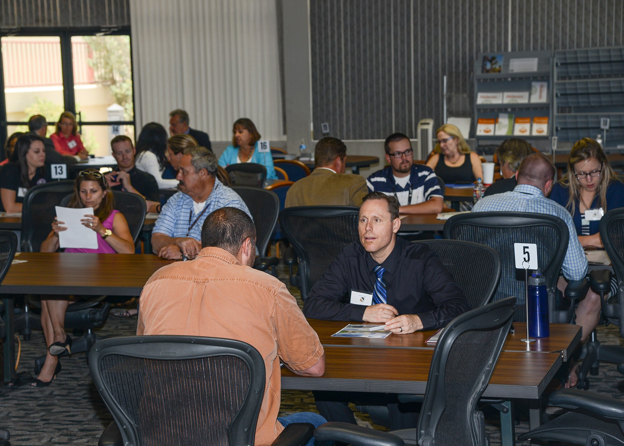 Match-making sessions during the Air Force Test Center Small Business Seminar allowed companies to pitch their services to base contracting officers. (U.S. Air Force Photo by Rebecca Amber)