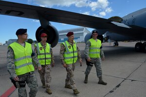 Members of the 127th Wing Security Forces Squadron and Latvian Military Police, who are also Presidential Guards, perform a security detail to guard both Michigan and Pennsylvania Air National Guard KC-135s during Saber Strike 2015. The Airmen from the 127th Wing, Michigan Air National Guard, have traveled to Latvia for the sole purpose of providing around-the-clock security to ensure the aircraft are completely secured and safe to support mission taskings during the exercise.  The Michigan National Guard is a part of a Department of Defense sponsored State Partnership Program between Michigan and the Latvian government, which began in 1993. Exercise Saber Strike 2015 brought 14 ally and partner nations together to increase interoperability between military forces. (U.S.Air National Guard photo by Capt. Anthony J. Lesterson)