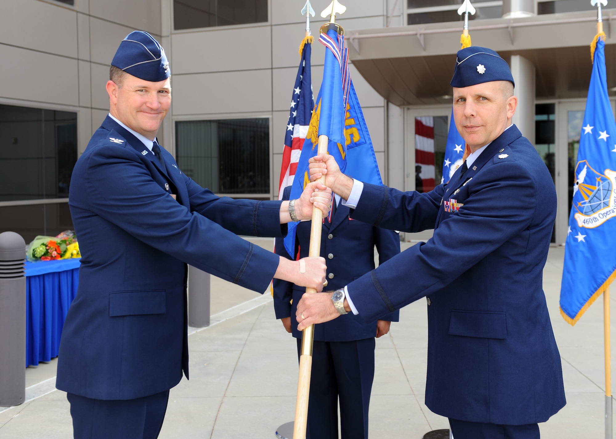 The 11th Space Warning Squadron held its Change of Command ceremony Thursday at the 50th Space Wing headquarters building at Schriever Air Force Base, Colo.  Col. Michael Jackson, 460th Operations Group commander, presided over the ceremony where Lt. Col. Thomas Colvin relinquished command to Lt. Col. Brent Morris. (U.S. Air Force Photo/Dennis Rogers)