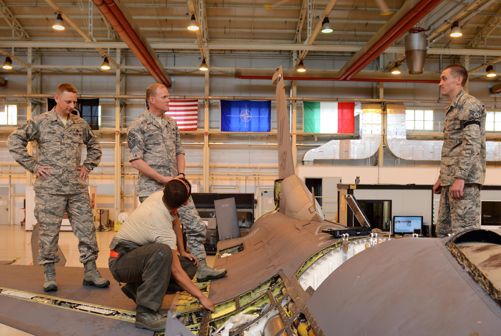 Chief Master Sergeant of the Air Force James A. Cody speaks to crew chiefs assigned to the 31st Maintenance Squadron, June 16, 2015, at Aviano Air Base, Italy. Cody visited Aviano to thank Airmen and their families for their continued sacrifices, receive feedback on important topics and learn more about Aviano’s mission. (U.S. Air Force photo by Airman 1st Class Deana Heitzman/Released)