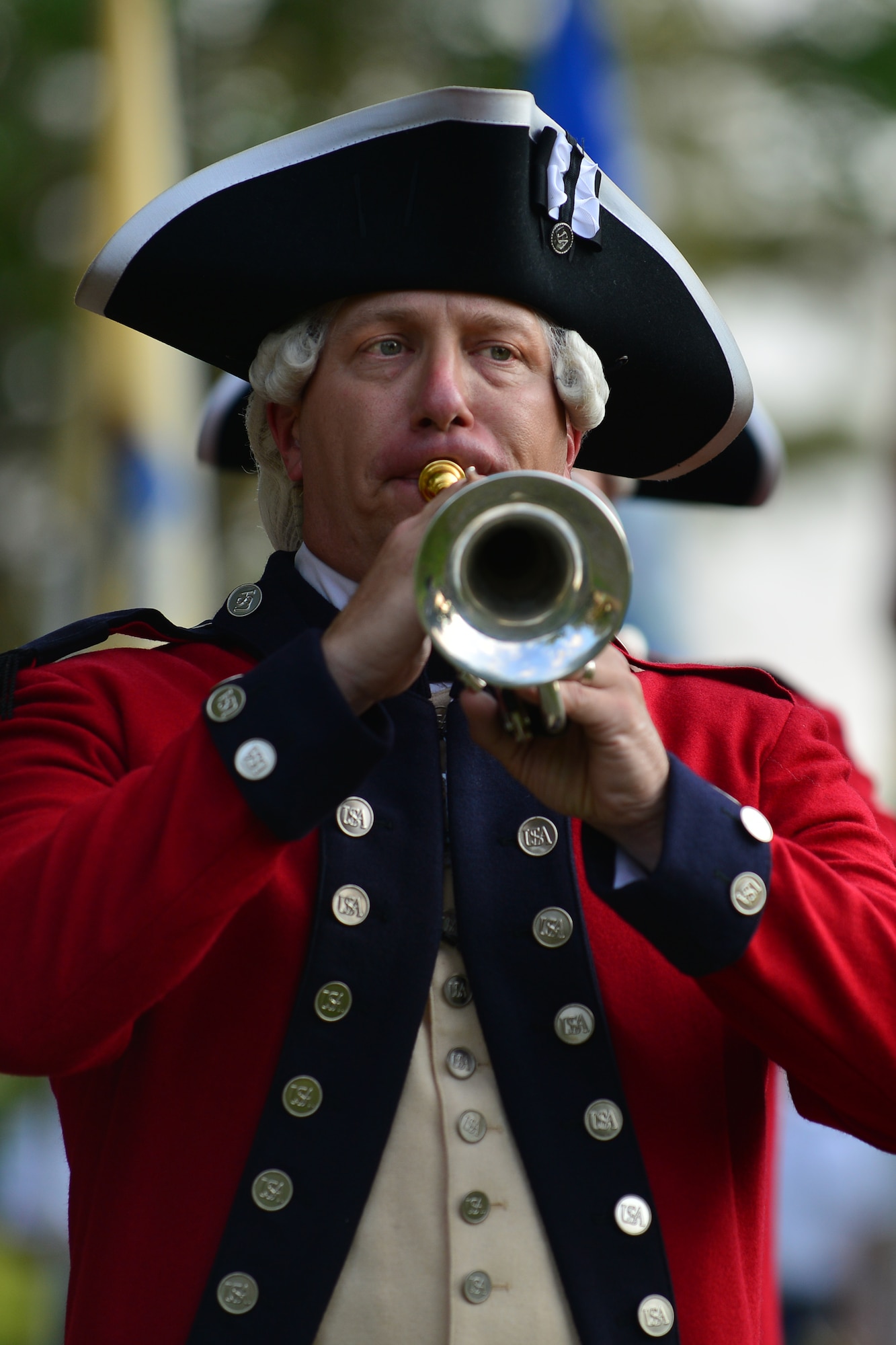 A 3rd U.S. Infantry Regiment (Old Guard) Fife and Drum Corps member performs during the 240th Army Birthday concert and streamer ceremony at Fort Eustis, Va., June 12, 2015. The corps, which is the only of its kind in the military, is composed of five ensembles, all of which performed during the ceremony.  (U.S. Air Force photo by Staff Sgt. Natasha Stannard/Released)