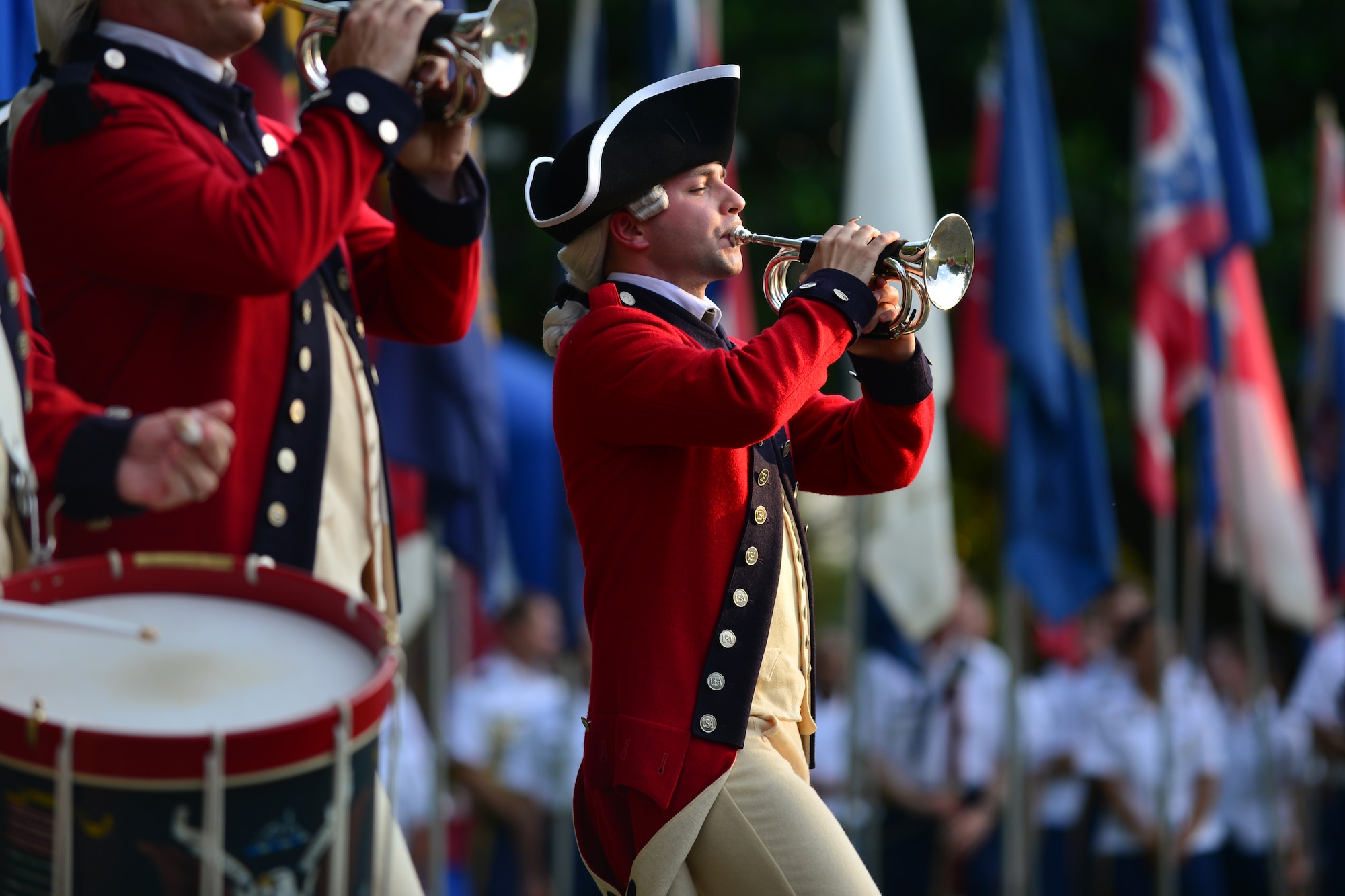 A 3rd U.S. Infantry Regiment (Old Guard) Fife and Drum Corps member performs during the 240th Army Birthday concert and streamer ceremony at Fort Eustis, Va., June 12, 2015. Service members and community members came together during this ceremony, which celebrated the U.S. Army’s 240-year history.  (U.S. Air Force photo by Staff Sgt. Natasha Stannard/Released)