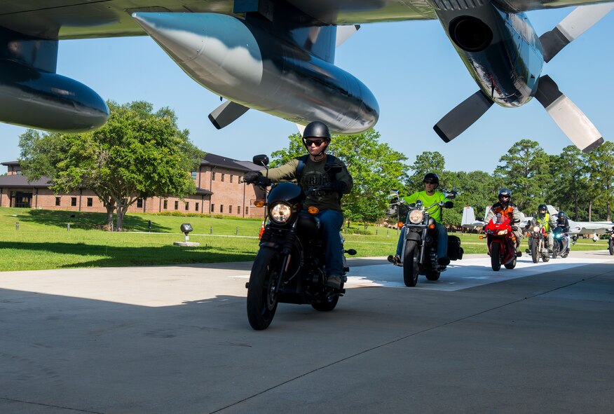 Team Moody motorcyclists ride off during the Annual Wing Mentorship Ride June 15, 2015, at Moody Air Force Base, Ga. The annual ride consisted of a safety briefing, raffle and ended with a 120-mile ride to and from Lake Park, Ga. (U.S. Air Force Airman 1st Class Ceaira Tinsley/Released)