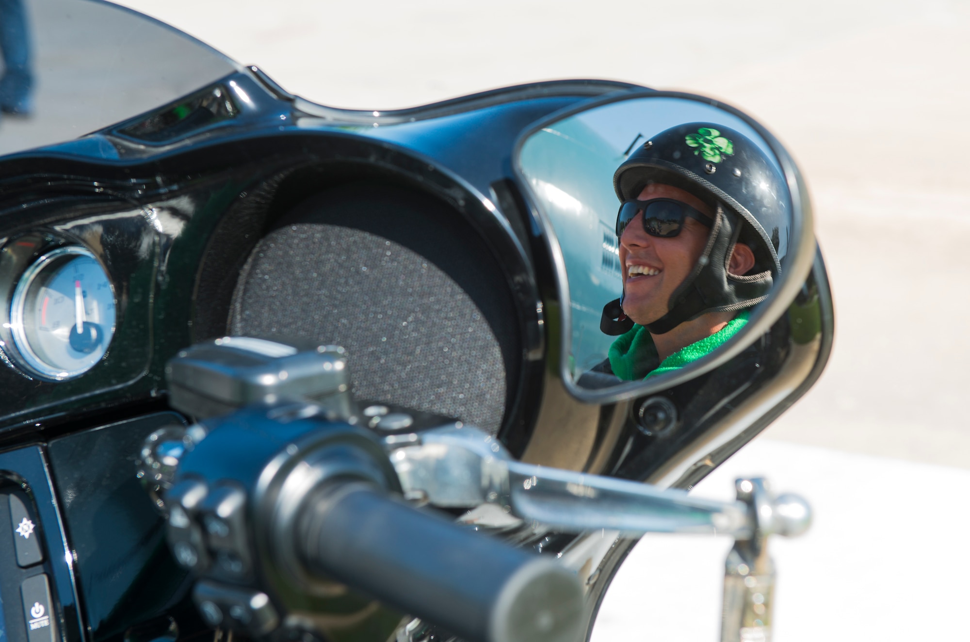 U.S. Air Force Capt. Scott Randle, 23d Communications Squadron flight commander, smiles before the start of the Annual Wing Mentorship Ride June 15, 2015, at Moody Air Force Base, Ga. Experienced riders were paired with younger riders to mentor and critique their riding skills throughout the day.  (U.S. Air Force Airman 1st Class Ceaira Tinsley/Released)