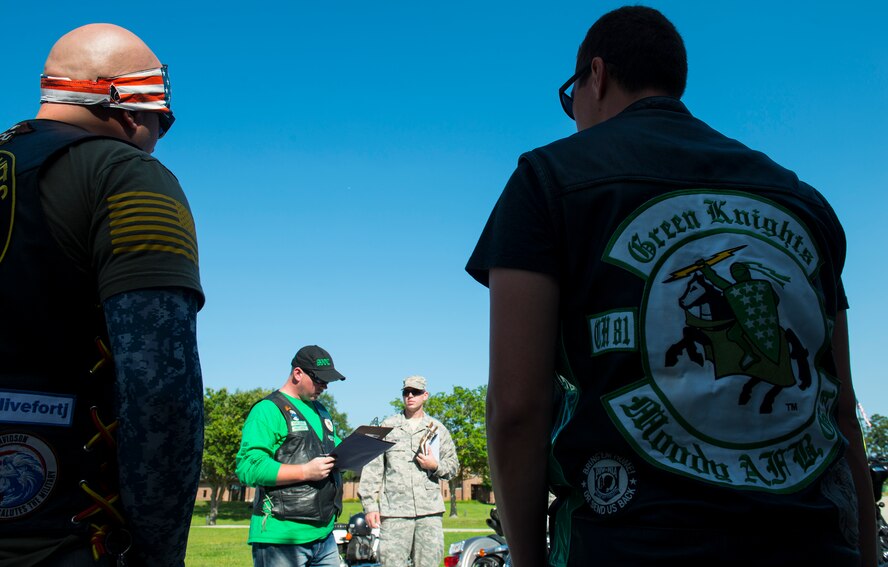 U.S. Air Force Tech. Sgt. Chris Dewitt, 23d Maintenance Operations Flight senior controller and president of the Green Knights motorcycle club, briefs motorcycle safety to Team Moody motorcyclists before the Annual Wing Mentorship Ride June 15, 2015, at Moody Air Force Base, Ga. Dewitt talked about risk management, mentorship, wearing personal protective equipment and overall riding awareness. (U.S. Air Force Airman 1st Class Ceaira Tinsley/Released)
