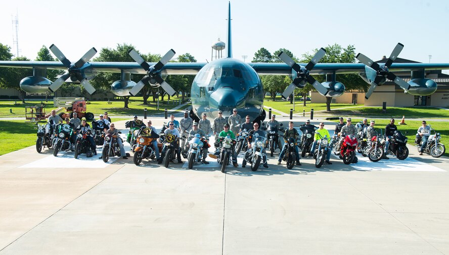 Team Moody motorcyclists pose for a photo before kicking off the Annual Wing Mentorship Ride June 15, 2015, at Moody Air Force Base, Ga. The 23d Wing safety office organized the event to educate and promote motorcycle safety while boosting rider confidence. (U.S. Air Force Airman 1st Class Ceaira Tinsley/Released)