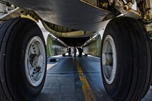 Airmen from 5th Aircraft Maintenance Squadron perform routine maintenance underneath a B-52H Stratofortress at Minot Air Force Base, N.D., June 11, 2015. The bomber is capable of flying at high subsonic speeds at altitudes up to 50,000 feet. (U.S. Air Force photo/Airman 1st Class Justin T. Armstrong)