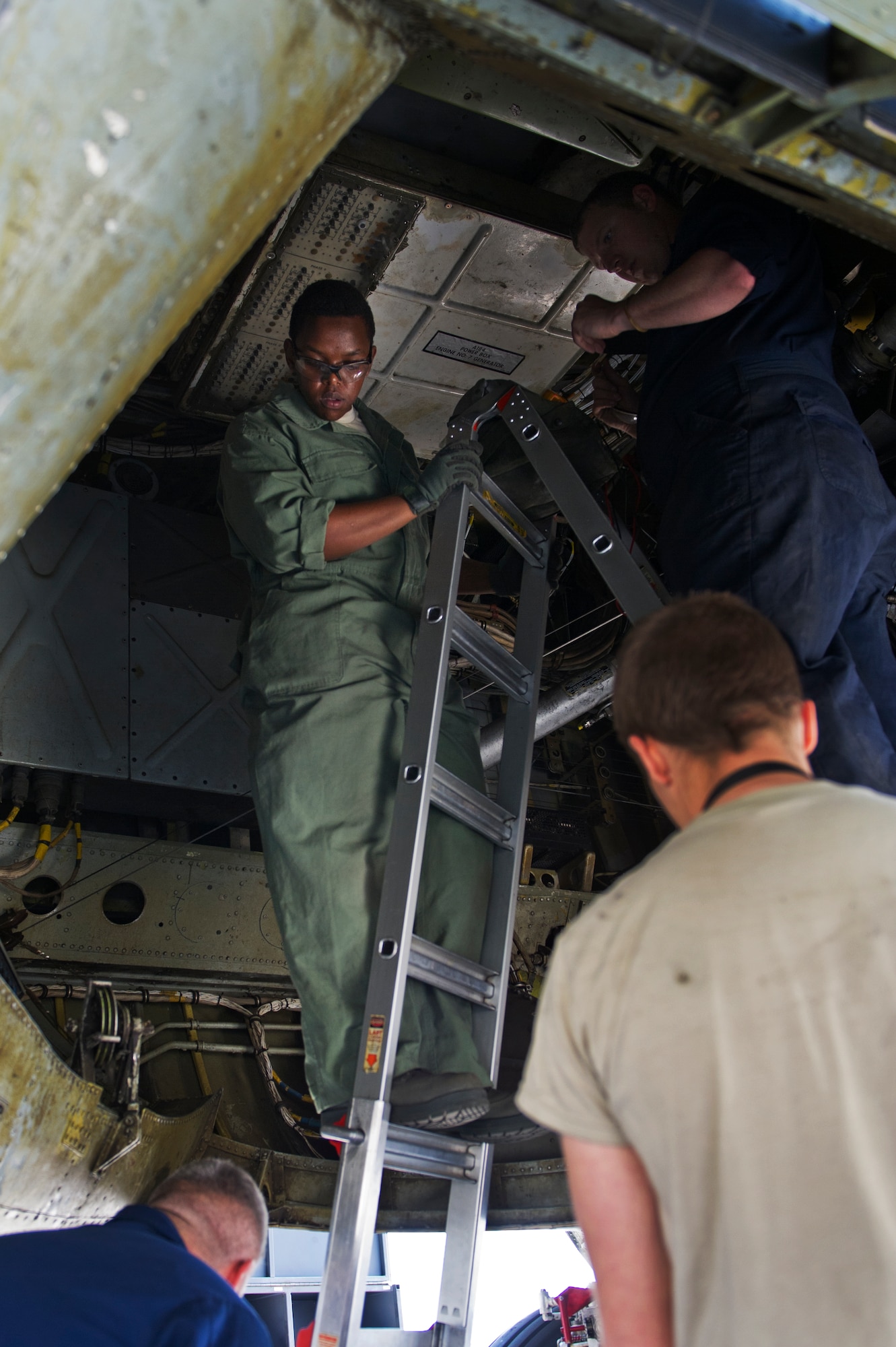 Airmen from 5th Aircraft Maintenance Squadron perform routine maintenance inside a B-52H Stratofortress at Minot Air Force Base, N.D., June 11, 2015.   For more than 40, years B-52 Stratofortresses have been the backbone of the manned strategic bomber force for the United States. (U.S. Air Force photo/Airman 1st Class Justin T. Armstrong)