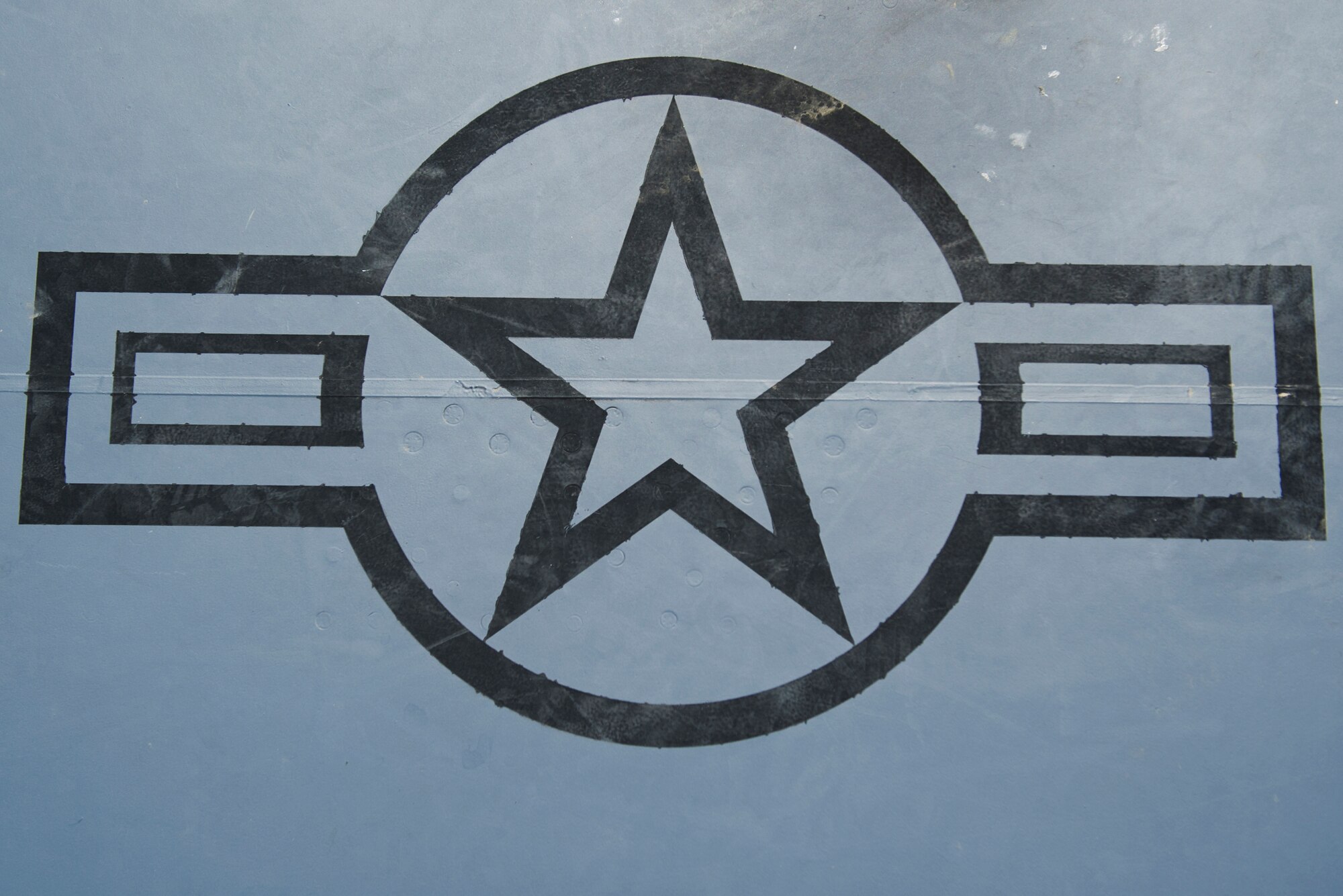A U.S. military aircraft roundel adorns the wing of a B-52H Stratofortress at Minot Air Force Base, N.D., June 11, 2015. Usually circular in design, roundels are insignia on military aircraft used to identify the nation of origin. (U.S. Air Force photo/Airman 1st Class Justin T. Armstrong)