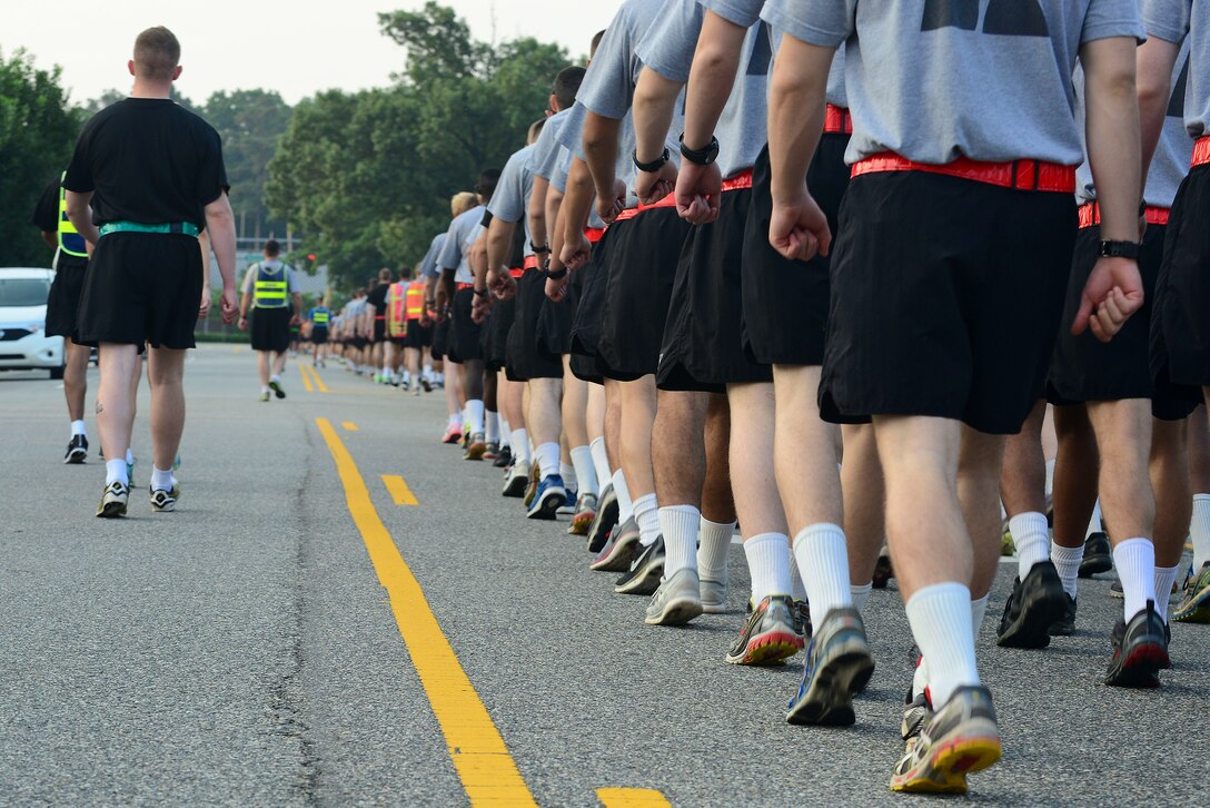U.S. Army Soldiers march in formation before the Army birthday run at Fort Eustis, Va., June 11, 2015. The Soldiers used the run as a way to emphasize esprit de corps and to celebrate the 240th birthday of the Army.  (U.S. Air Force photo by Senior Airman Kimberly Nagle/Released)  