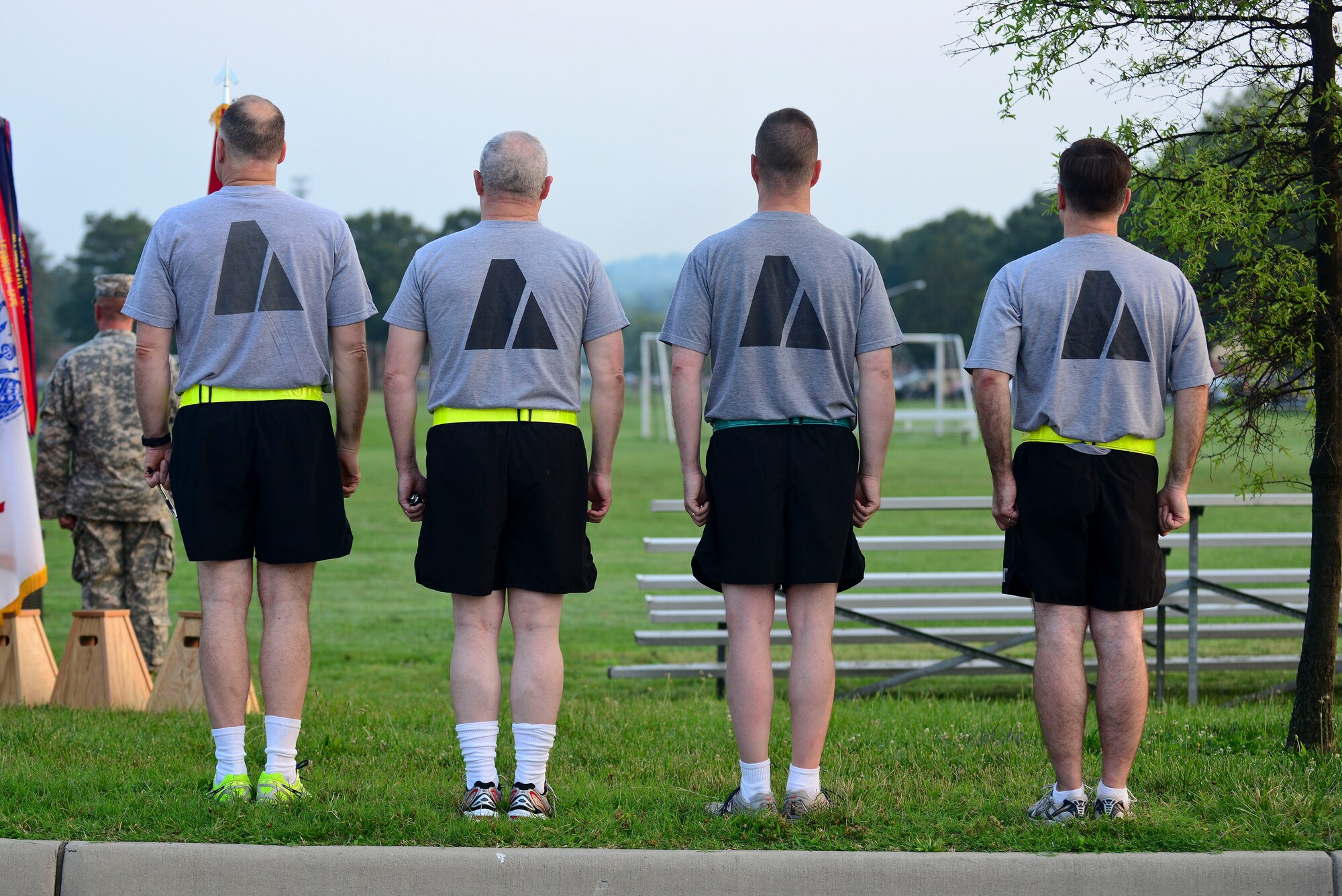 Fort Eustis leadership stands at attention before the U.S. Army Birthday run at Fort Eustis, Va., June 11, 2015. Soldiers ran 2.2 miles to kick-off the 240th Army birthday celebration at the installation. (U.S. Air Force photo by Senior Airman Kimberly Nagle/Released)  