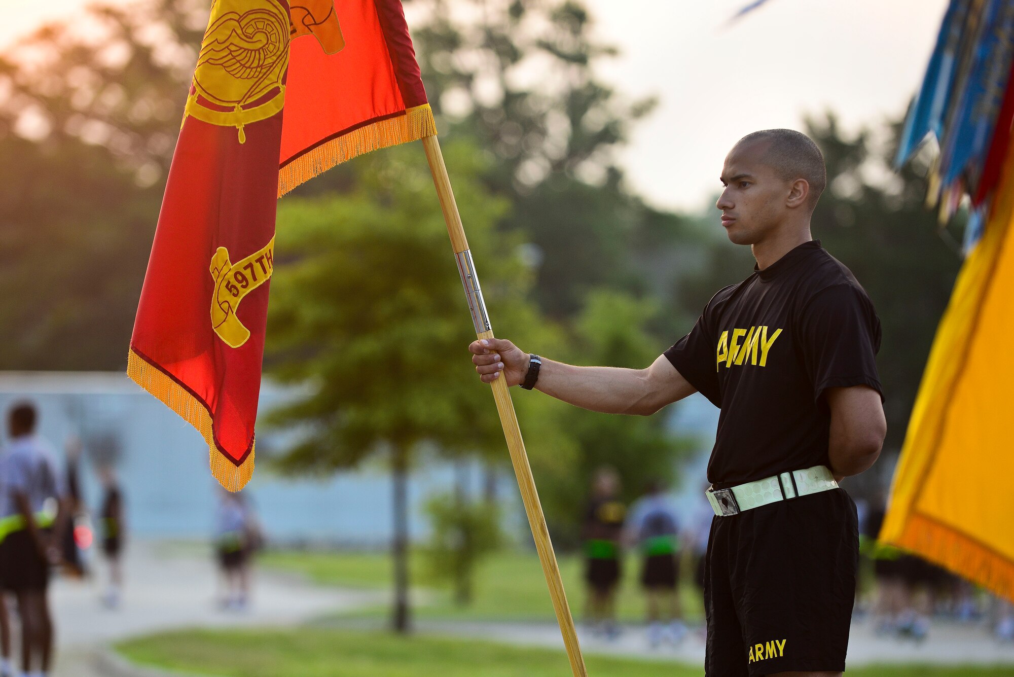U.S. Army Spc. Mitchell Keeton, 688th Rapid Port Opening Element, 833rd Transportation Battalion, 597th Transportation Brigade, Defense Travel System technician, stands in formation at Fort Eustis, Va., June 11, 2015. Soldiers stood in formation with their units before an installation-wide run celebrating the Army’s 240th birthday.  (U.S. Air Force photo by Senior Airman Kimberly Nagle/Released)  