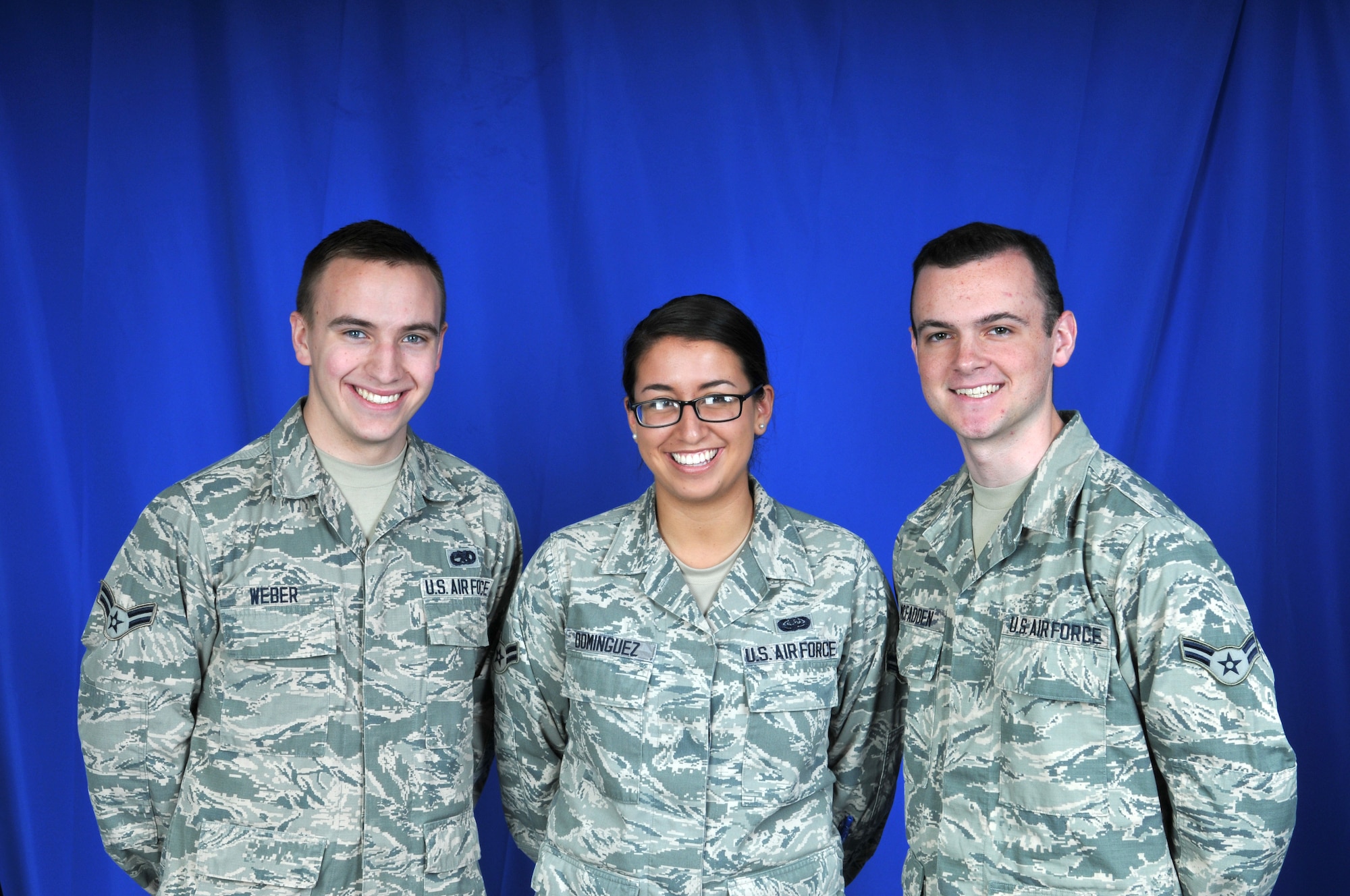 U.S. Air Force Airmen 1st Class Ryan Weber, Sharon Dominguez and Luke McFadden pose for a photo. The three Airmen from the Delaware Air National Guard's 166th Airlift Wing in New Castle, Del. have the U.S. Air Force Academy in their future. (U.S. Air National Guard photo by 1st Lt. Valerie Harwood)