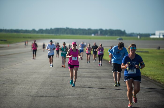 Runners race towards the finish during this year’s “Run the Runway 5k” event June 13, 2015, at Joint Base Charleston S.C.  The annual event, now open to the public, was conducted on a 3.1 mile course certified by USA Track and Field.  (U.S. Air Force photo/Senior Airman Jared Trimarchi)