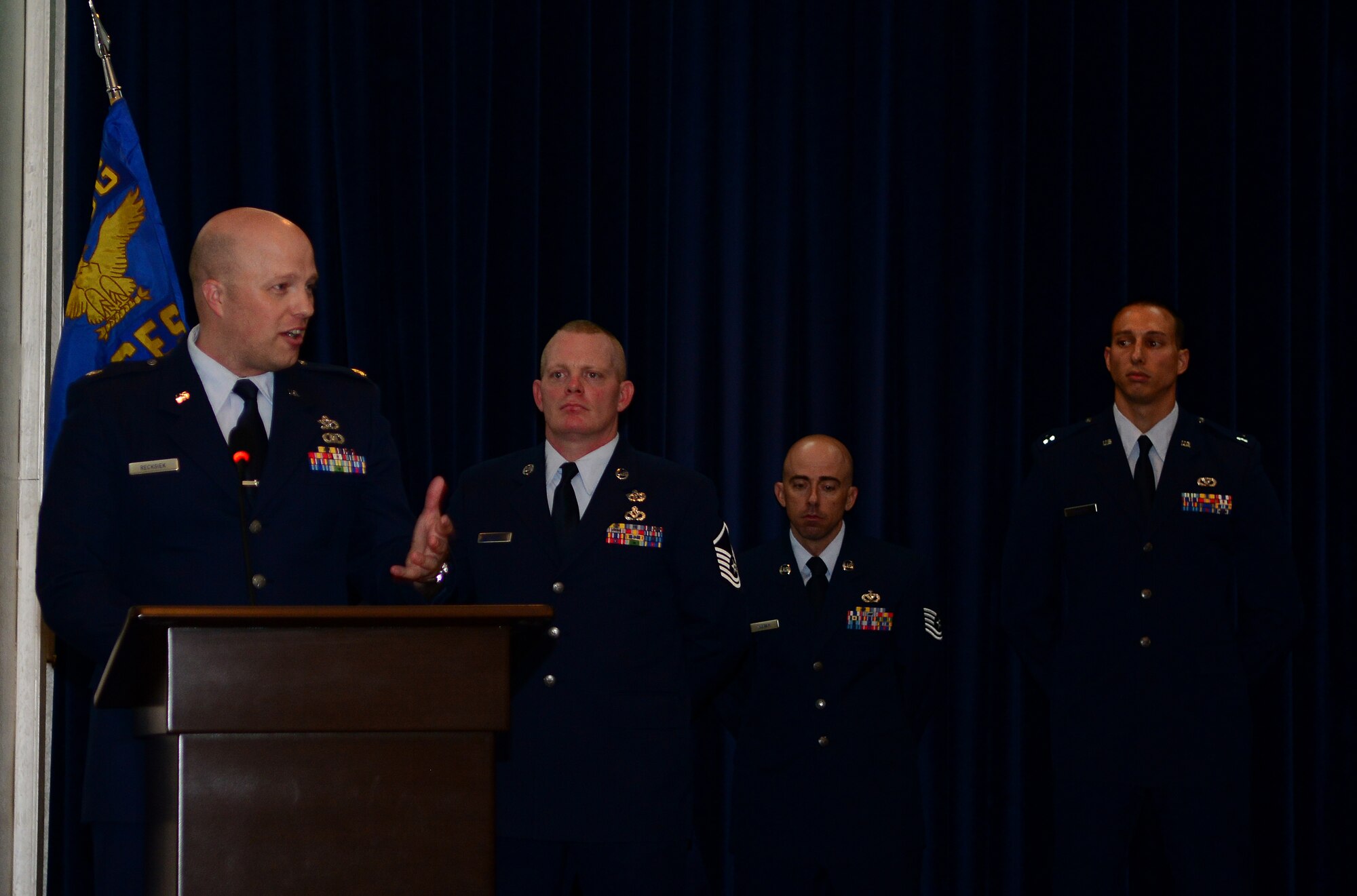 Maj. Karl Recksiek, 39th Civil Engineer Squadron commander, speaks to those in attendance after taking command during the 39th CES change of command ceremony June 16, 2015, at Incirlik Air Base, Turkey. Prior to taking command, Recksiek was the president, Chief of Theater Strategic Plans, United States Air Forces in Europe-Air Forces Africa, Ramstein Air Base, Germany. (U.S. Air Force photo by Staff Sgt. Caleb Pierce/Released)