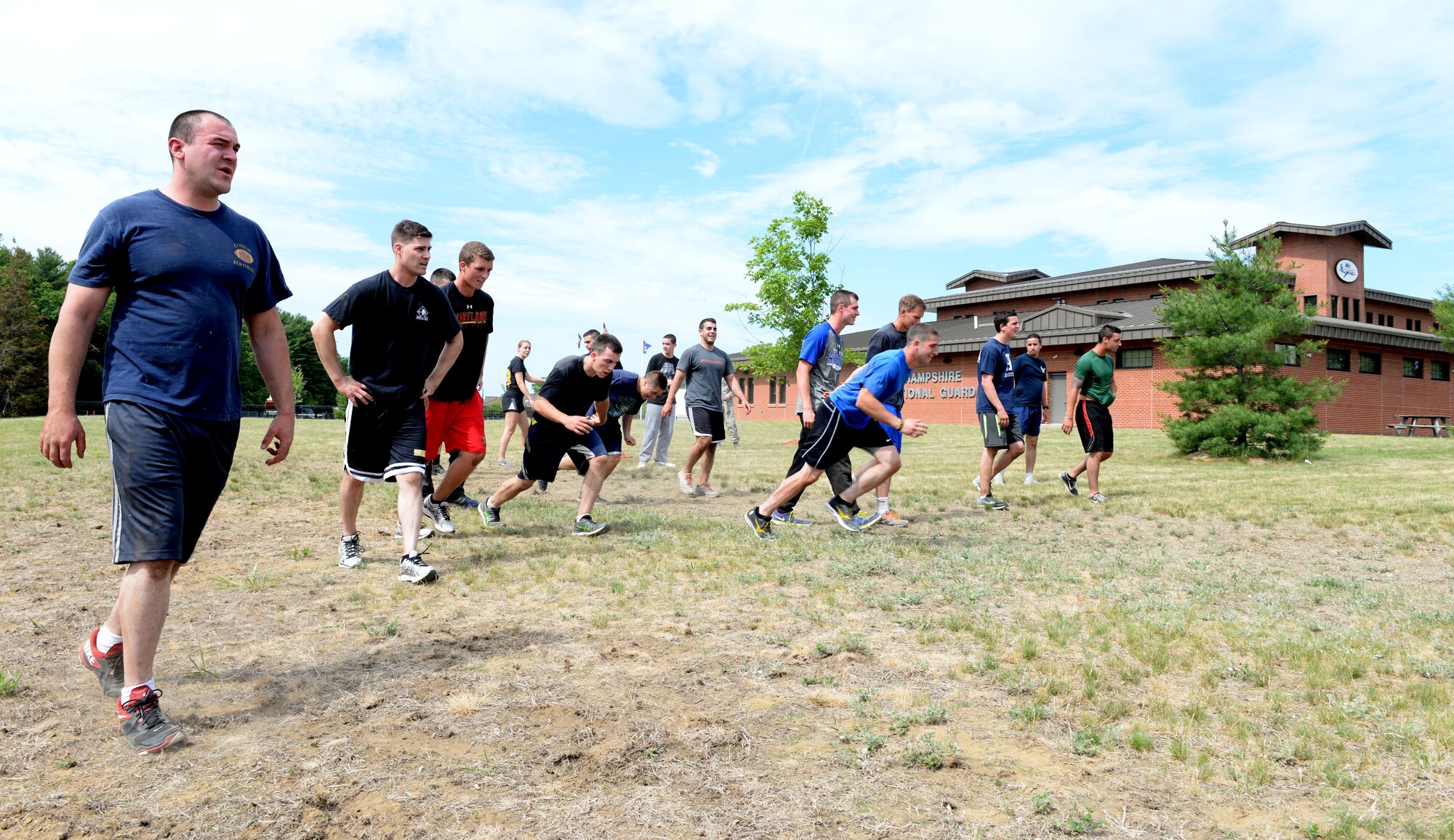 Members of the 157th Air Refueling Wing Student Flight battle it out in a game of capture the flag during physical training June 14, 2015 at Pease Air National Guard Base, N.H. Student Flight prepares new members of the New Hampshire Air National Guard for Basic Military Training and technical school. (N.H. Air National Guard photo by Staff Sgt. Curtis J. Lenz/ RELEASED)