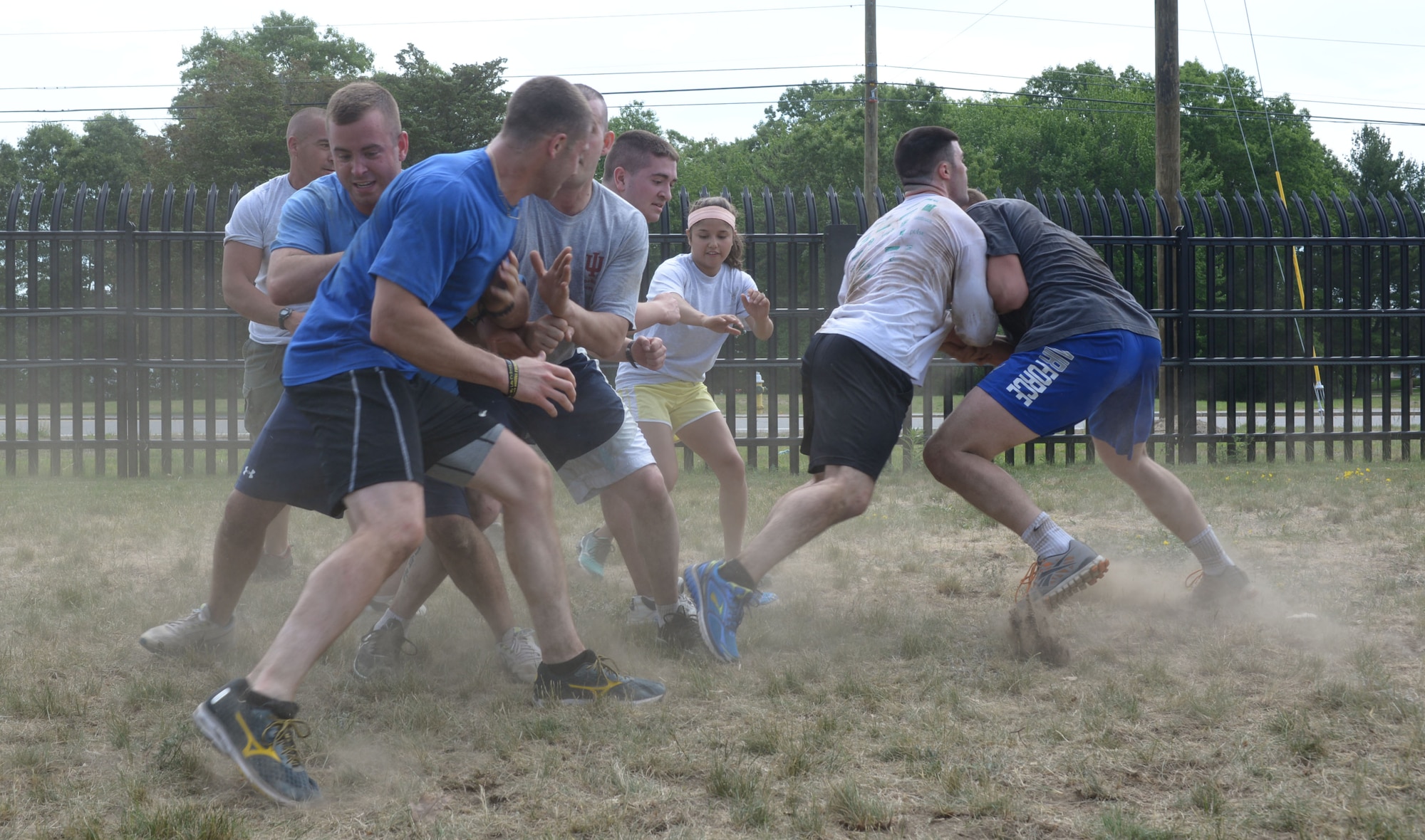 Members of the 157th Air Refueling Wing Student Flight battle it out in a game of capture the flag during physical training June 14, 2015 at Pease Air National Guard Base, N.H. Student Flight prepares new members of the New Hampshire Air National Guard for Basic Military Training and technical school. (N.H. Air National Guard photo by Airman Ashlyn J. Correia/ RELEASED)