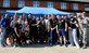 U.S. Air Force Airmen from the 100th Air Refueling Wing staff agencies pose for a photo after winning the Marauder Melee sports competition June 11, 2015, on RAF Mildenhall, England. After a 5k run, the event  consisted of  several fitness challenges including volleyball, soccer and rock climbing, of which Wing Staff Agency teams either won first or second place earning them the most overall points amongst several groups and squadrons. (U.S. Air Force photo by Senior Airman Kate Thornton/Released)