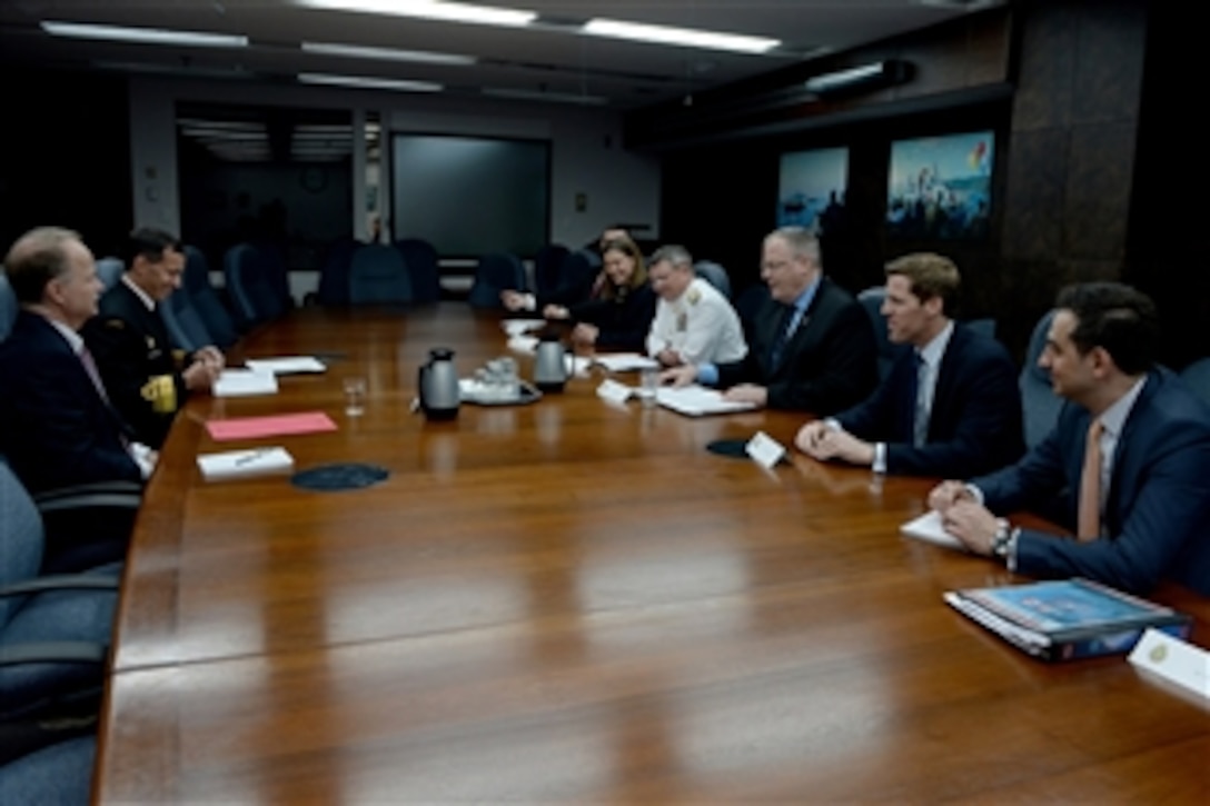 Deputy Defense Secretary Bob Work meets with Deputy Minister John Forster at the National Defense Headquarters in Canada, June 15, 2015. The two defense leaders met to discuss issues of mutual importance. 