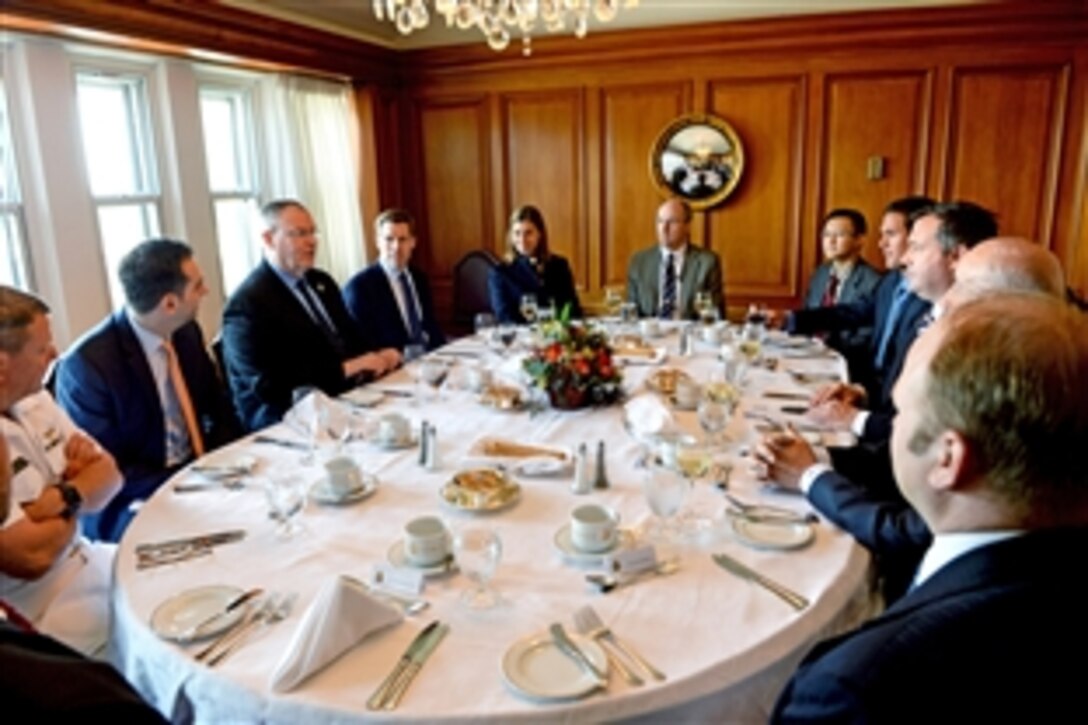 U.S. Deputy Defense Secretary Bob Work meets with Minister of National Defense Jason Kenney and Associate Minister of National Defense Julian Fantino at the Canadian Parliament in Ottawa, Canada, June 15, 2015. The leaders discussed global security challenges, including collaboration for ongoing operations in Iraq to counter the Islamic State of Iraq and the Levant.