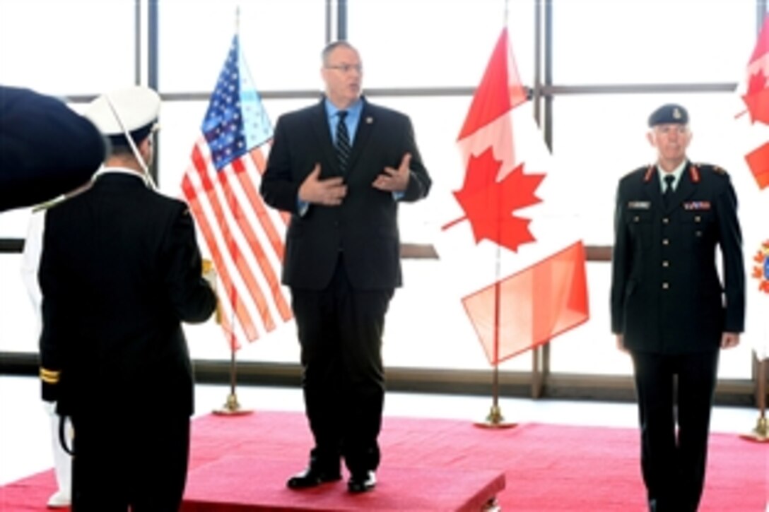 U.S. Deputy Defense Secretary Bob Work speaks during a Guard of Honor ceremony at the National Defense Headquarters in Ottawa, Canada, June 15, 2015. Deputy Secretary Work is meeting with senior Canadian officials to discuss issues of mutual importance.