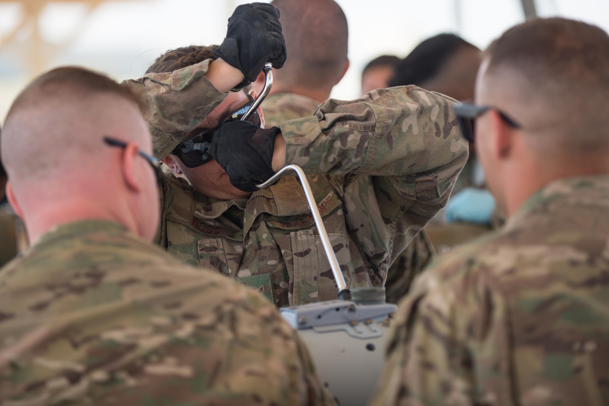 U.S. Air Force Airman 1st Class Kristi Wood, 455th Expeditionary Maintenance Squadron Munitions Flight munitions technician, completes a six month inspection on a Guided Bomb Unit-54 (GBU-54) munition at Bagram Airfield, Afghanistan, June 15, 2015. The 455th EMXS Munitions Flight ensures that every munition loaded onto an F-16 Fighting Falcon will perform as expected when used. (U.S. Air Force photo by Tech. Sgt. Joseph Swafford/Released)