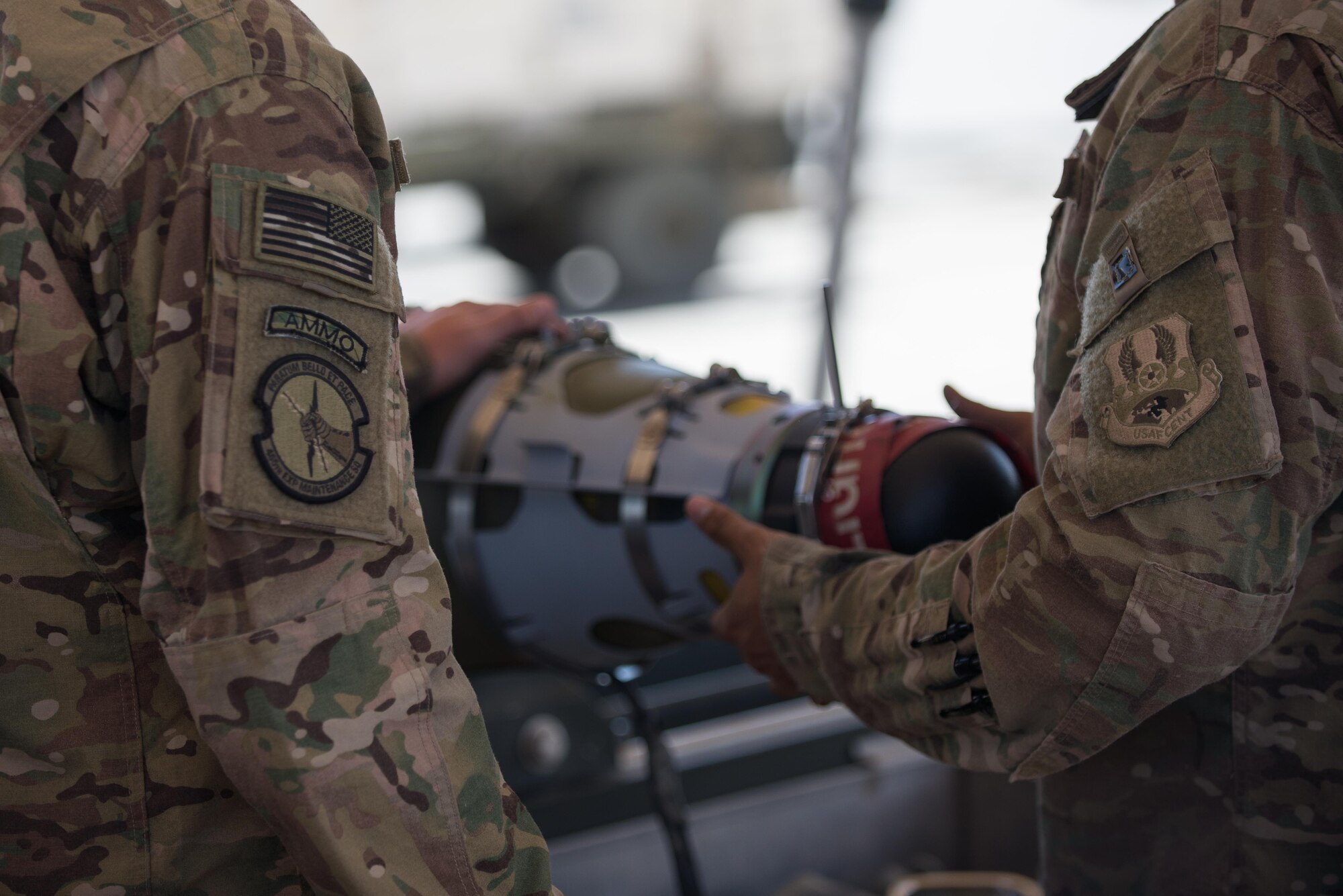 U.S. Airmen assigned to the 455th Expeditionary Maintenance Squadron Munitions Flight perform a six month inspection on Guided Bomb Unit-54 (GBU-54) munition at Bagram Airfield, Afghanistan, June 15, 2015. The 455th EMXS Munitions Flight ensures that every munition loaded onto an F-16 Fighting Falcon will perform as expected when used. (U.S. Air Force photo by Tech. Sgt. Joseph Swafford/Released)