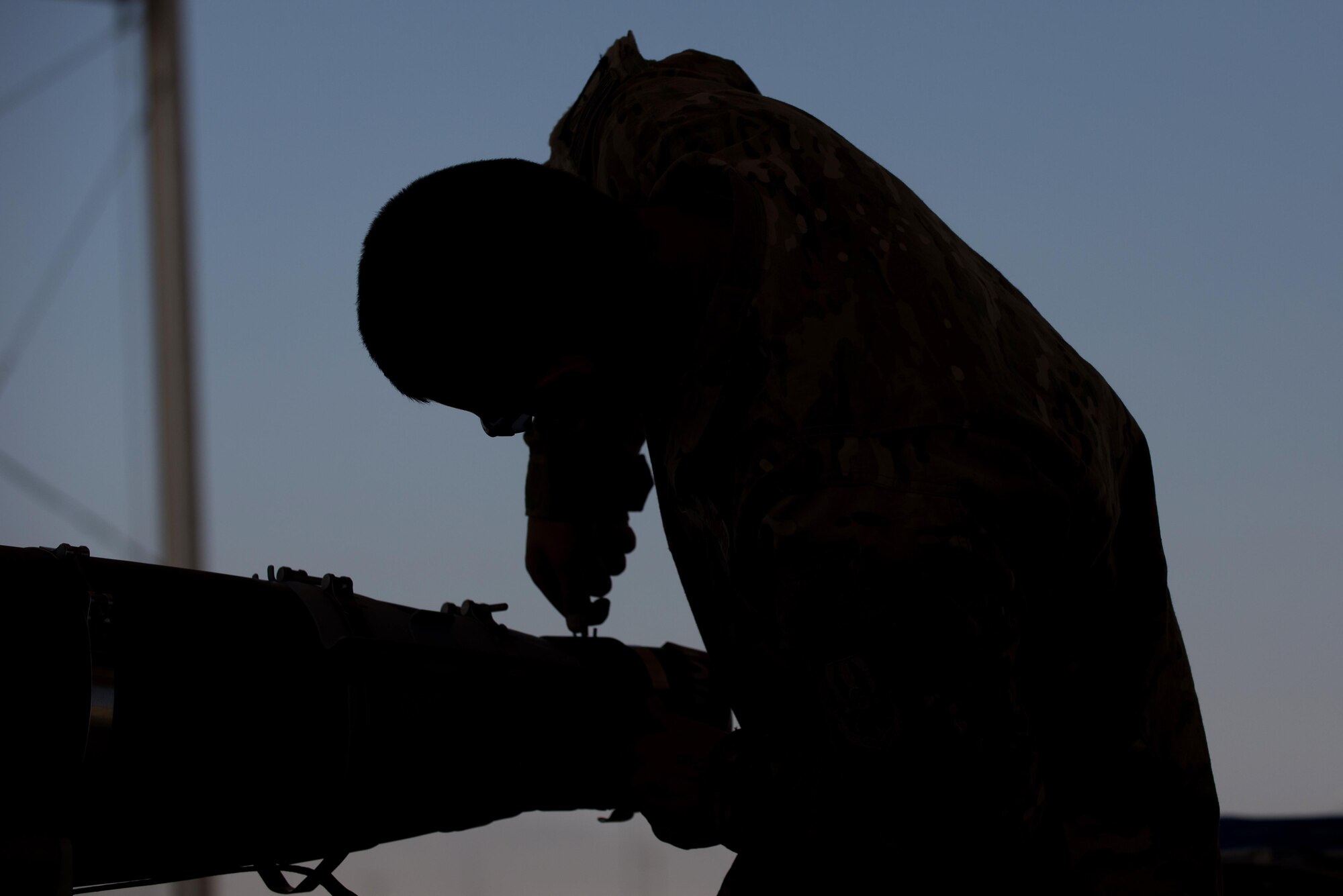 U.S. Air Force Airmen 1st Class Aaron Funck, 455th Expeditionary Maintenance Squadron Munitions Flight munitions technician, completes a six month inspection on a Guided Bomb Unit-54 (GBU-54) munition at Bagram Airfield, Afghanistan, June 15, 2015. The 455th EMXS Munitions Flight ensures that every munition loaded onto an F-16 Fighting Falcon will perform as expected when used. (U.S. Air Force photo by Tech. Sgt. Joseph Swafford/Released)