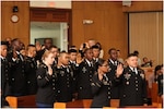 YONGSAN GARRISON, Seoul – Servicemembers make their Naturalization Oath during a Naturalization Ceremony at the South Post Chapel here July 4. UNC/CFC/USFK commander, Gen. Curtis M. Scaparrotti, congratulated 35 new U.S. citizens during his remarks at the ceremony. The newly-naturalized citizens were made up of servicemembers and spouses from various USFK units. (U.S. Army photo by Cpl. Choi, Ho-Gyu, U.S. Forces Korea PAO) 